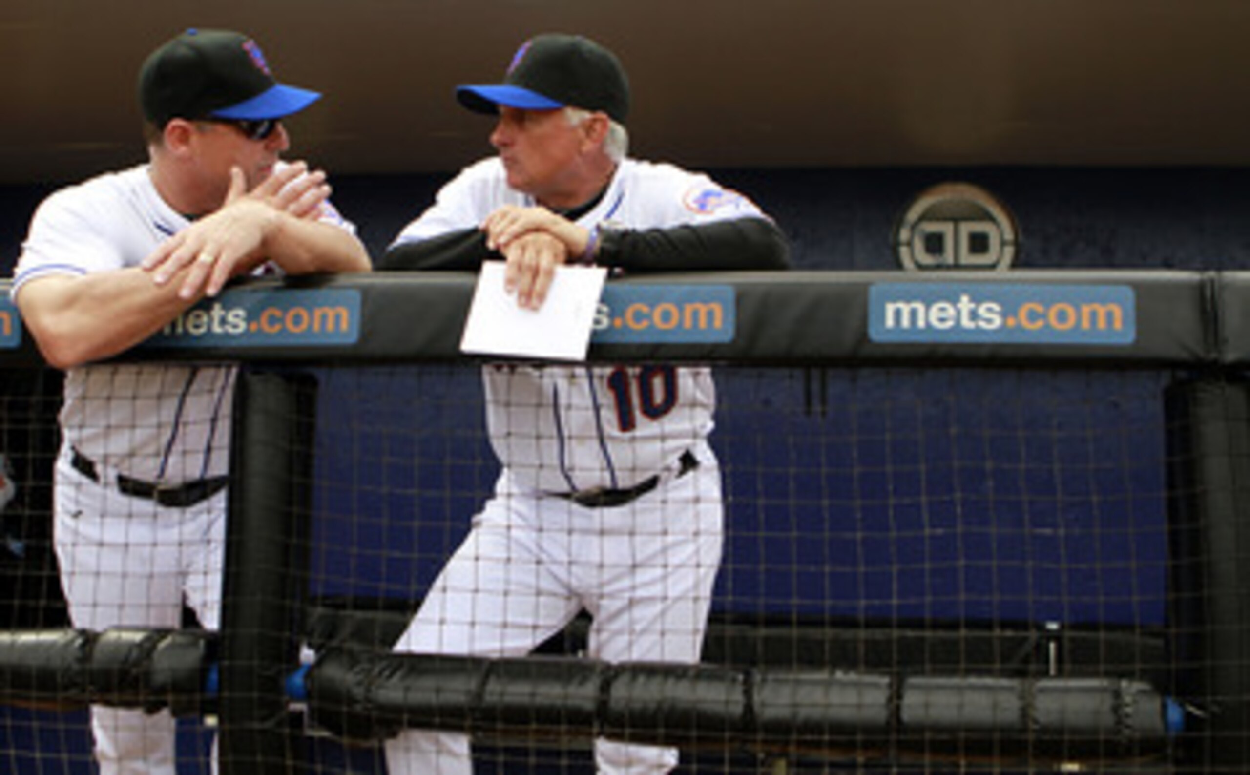 PORT ST. LUCIE, FL - FEBRUARY 26:  RY 26:  David Wright #5 and Manager Terry Collins (R) of the New York Mets chat prior to playing against the Atlanta Braves at Digital Domain Park on February 26, 2011 in Port St. Lucie, Florida.  (Photo by Marc Serota/G