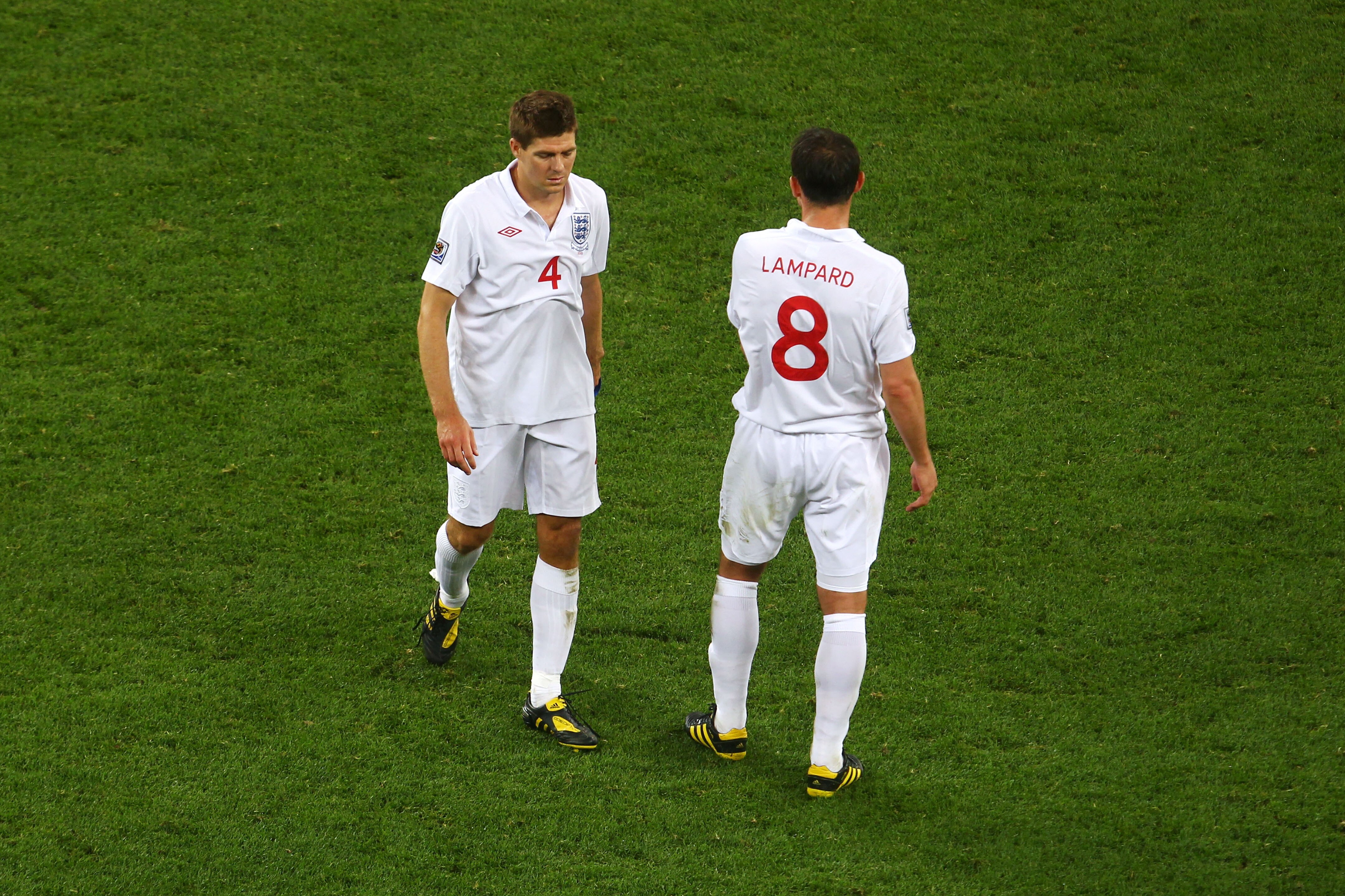 CAPE TOWN, SOUTH AFRICA - JUNE 18:  Captain Steven Gerrard and Frank Lampard of England look dejected during the 2010 FIFA World Cup South Africa Group C match between England and Algeria at Green Point Stadium on June 18, 2010 in Cape Town, South Africa.