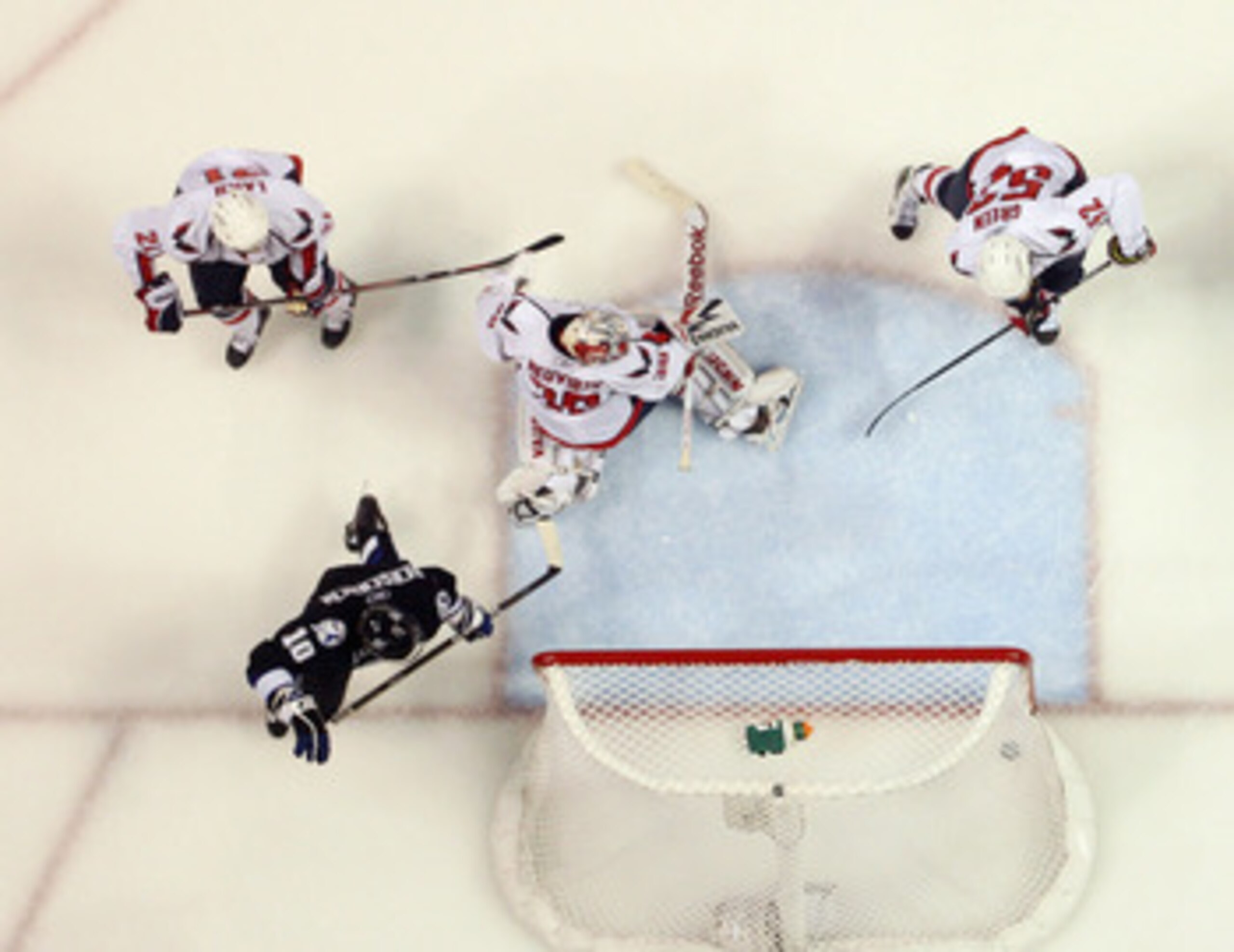 TAMPA, FL - MAY 03: Sean Bergenheim #10 of the Tampa Bay Lightning scores a first period goal against Michal Neuvirth #30 of the Washington Capitals in Game Three of the Eastern Conference Semifinals during the 2011 NHL Stanley Cup Playoffs at St Pete Tim