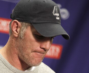 DETROIT, MI - JANUARY 02:  Brett Favre #4 of the Minnesota Vikings talks at a post game press conference after a 13-20 loss to the Detroit Lions at Ford Field on January 2, 2011 in Detroit, Michigan.  (Photo by Gregory Shamus/Getty Images)