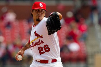 ST. LOUIS, MO - APRIL 21: Starter Kyle Lohse #26 of the St. Louis Cardinals pitches against the Washington Nationals at Busch Stadium on April 21, 2011 in St. Louis, Missouri.  (Photo by Dilip Vishwanat/Getty Images)