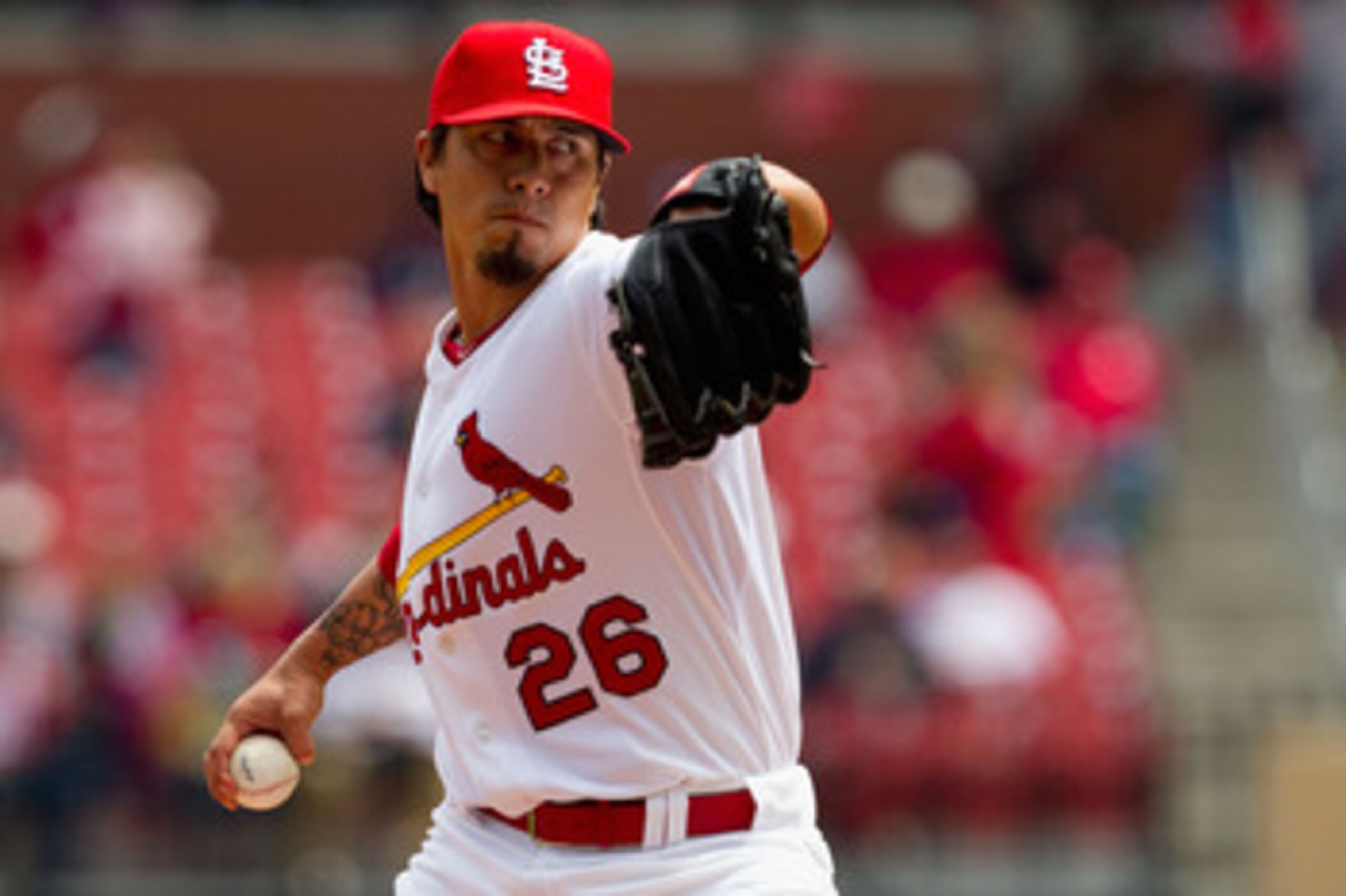 ST. LOUIS, MO - APRIL 21: Starter Kyle Lohse #26 of the St. Louis Cardinals pitches against the Washington Nationals at Busch Stadium on April 21, 2011 in St. Louis, Missouri.  (Photo by Dilip Vishwanat/Getty Images)