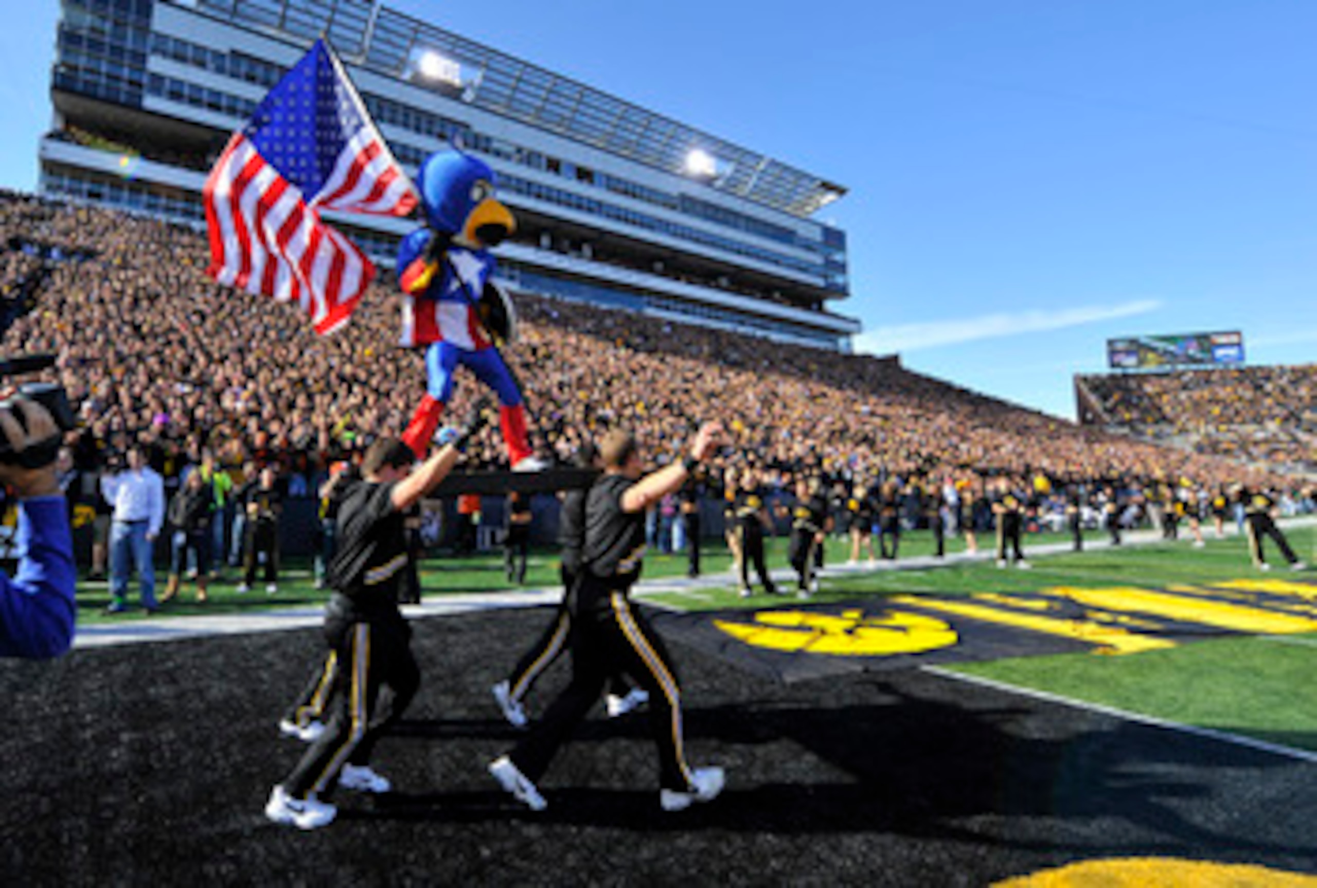 IOWA CITY, IA - OCTOBER 30- Dressed as Captain American Univeristy of Iowa mascot Herky the Hawk takes the field for the Michigan State Spartans NCAA football game at Kinnick Stadium on October 30, 2010 in Iowa City, Iowa. Iowa won 37-6 over Michigan Stat