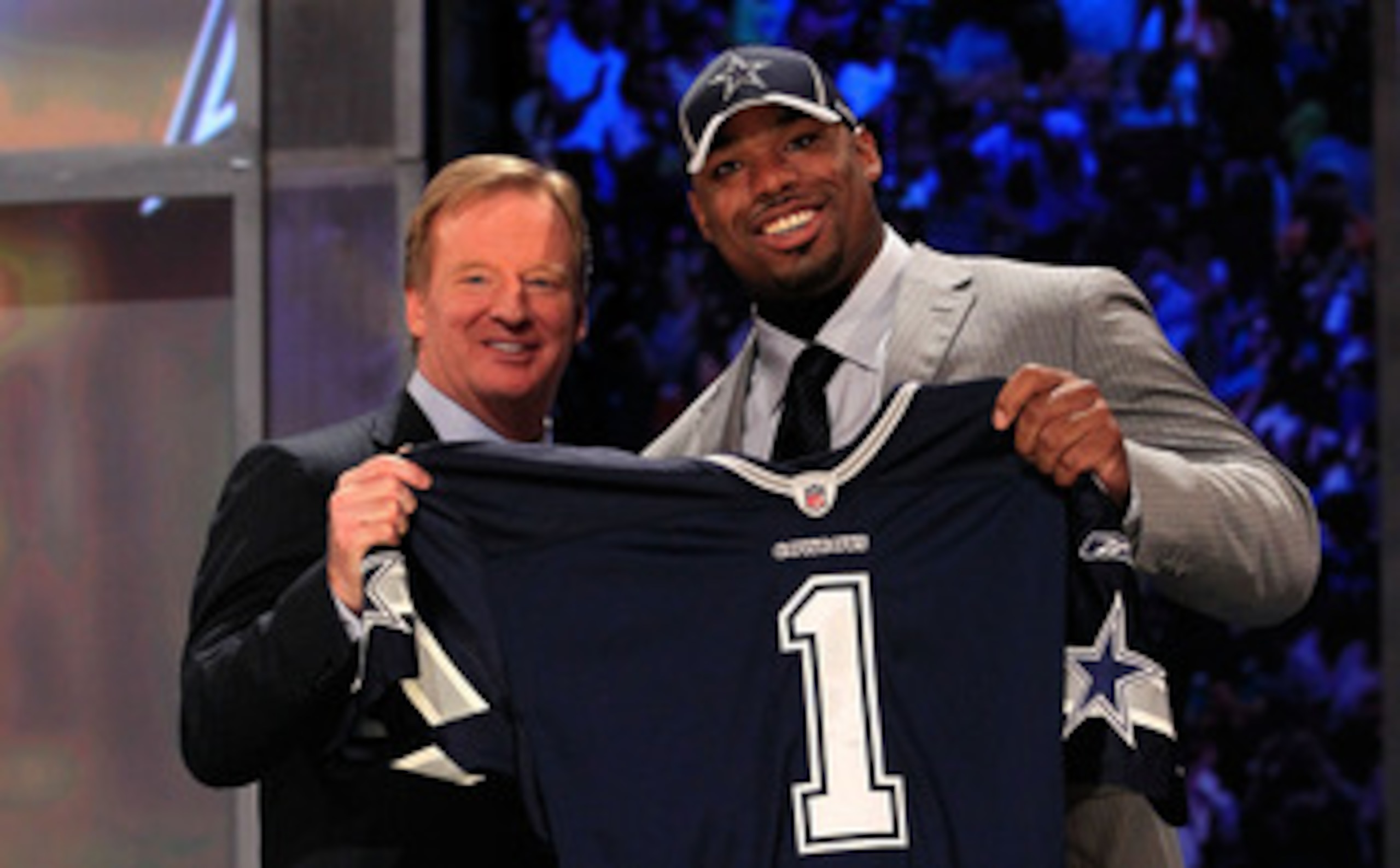 NEW YORK, NY - APRIL 28:  NFL Commissioner Roger Goodell (L) poses for a photo with Tyron Smith, #9 overall pick by the Dallas Cowboys, on stage during the 2011 NFL Draft at Radio City Music Hall on April 28, 2011 in New York City.  (Photo by Chris Trotma