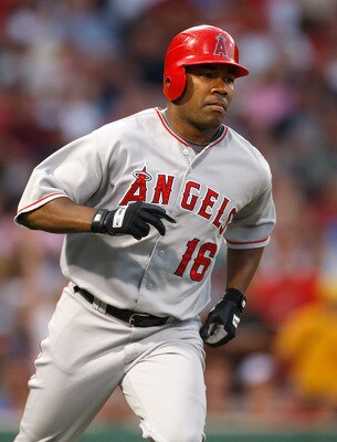 BOSTON - JULY 29: Garrett Anderson #16 of the Los Angeles Angels of Anaheim connects for a home run against the Boston Red Sox at Fenway Park on July 29, 2008 in Boston, Massachusetts.  (Photo by Jim Rogash/Getty Images)