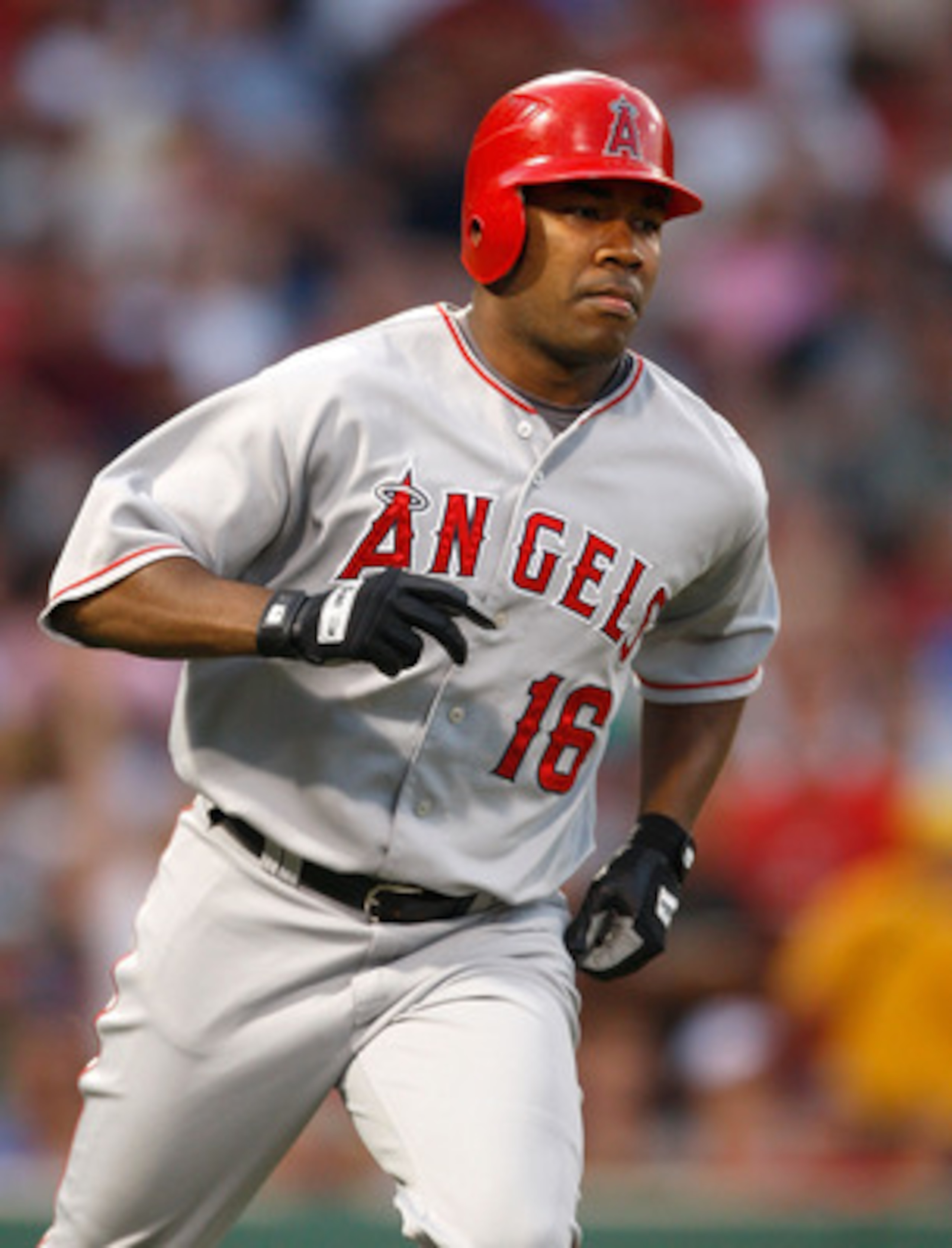 BOSTON - JULY 29: Garrett Anderson #16 of the Los Angeles Angels of Anaheim connects for a home run against the Boston Red Sox at Fenway Park on July 29, 2008 in Boston, Massachusetts.  (Photo by Jim Rogash/Getty Images)