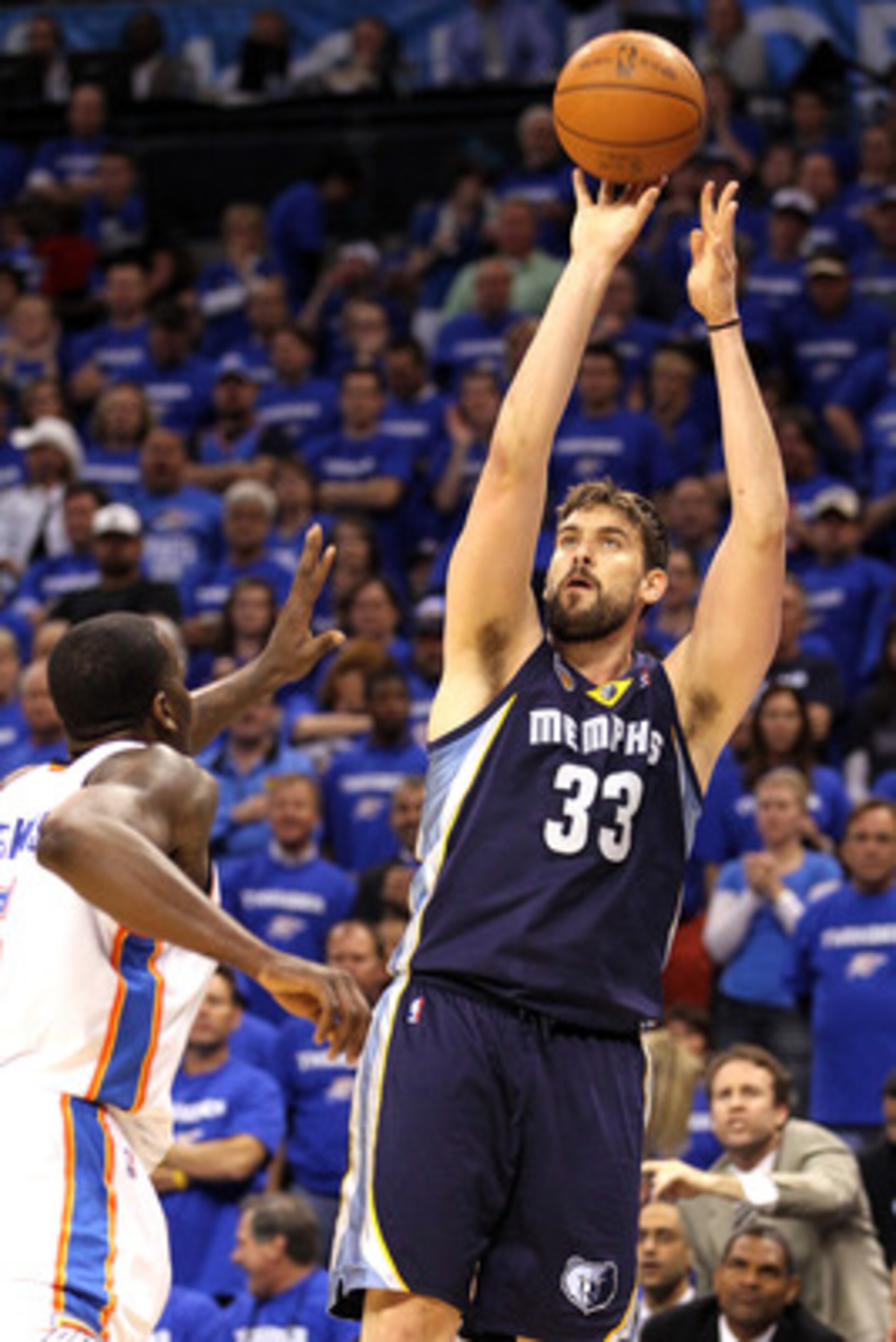 OKLAHOMA CITY, OK - MAY 03:  Marc Gasol #33 of the Memphis Grizzlies shoots a jumper over Kendrick Perkins #5 of the Oklahoma City Thunder in the first quarter in Game Two of the Western Conference Semifinals in the 2011 NBA Playoffs on May 3, 2011 at Okl