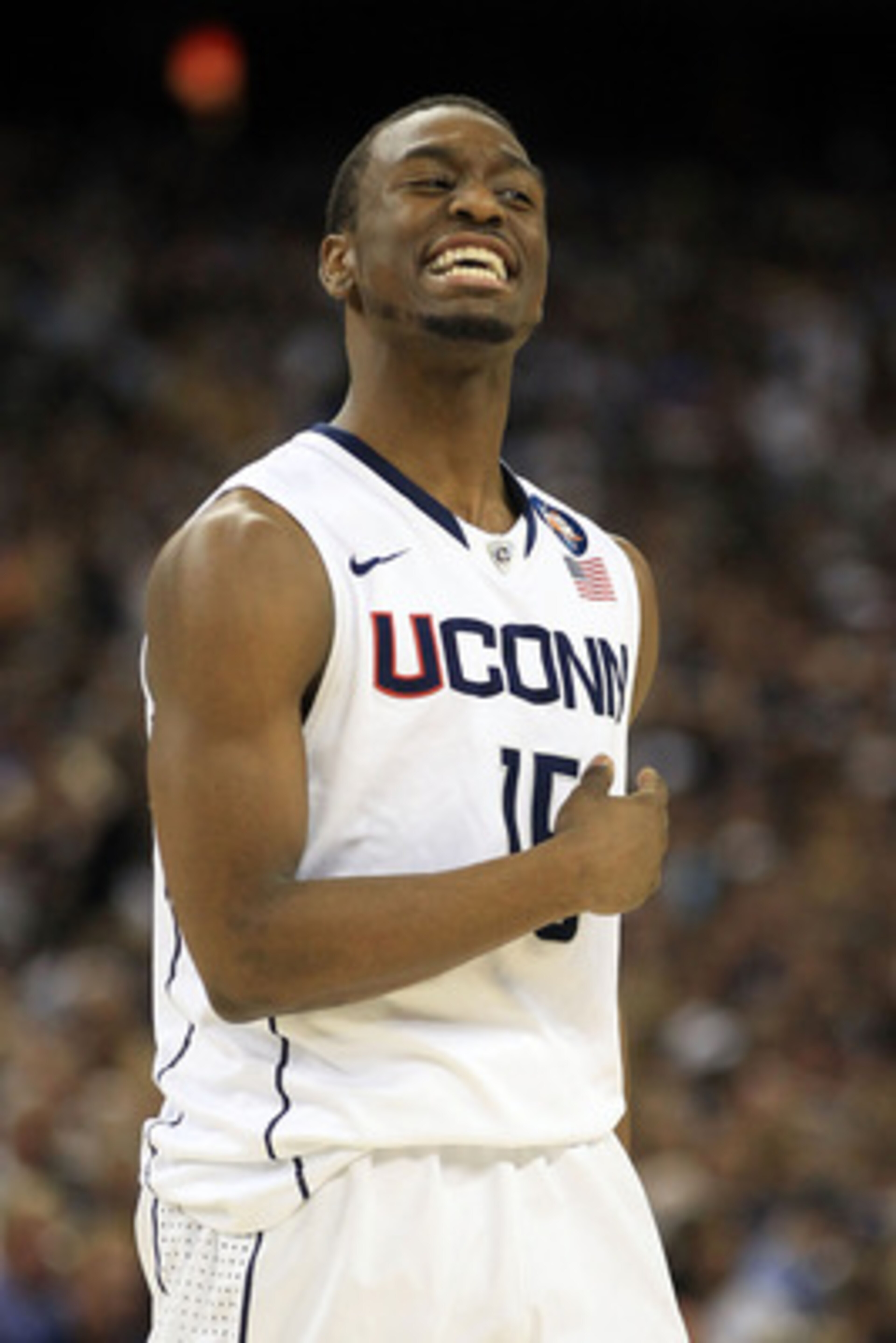 HOUSTON, TX - APRIL 04: Kemba Walker #15 of the Connecticut Huskies reacts after a play against the Butler Bulldogs during the National Championship Game of the 2011 NCAA Division I Men's Basketball Tournament at Reliant Stadium on April 4, 2011 in Houst HOUSTON, TX - APRIL 04: Kemba Walker #15 of the Connecticut Huskies reacts after a play against the Butler Bulldogs during the National Championship Game of the 2011 NCAA Division I Men's Basketball Tournament at Reliant Stadium on April 4, 2011 in Houst