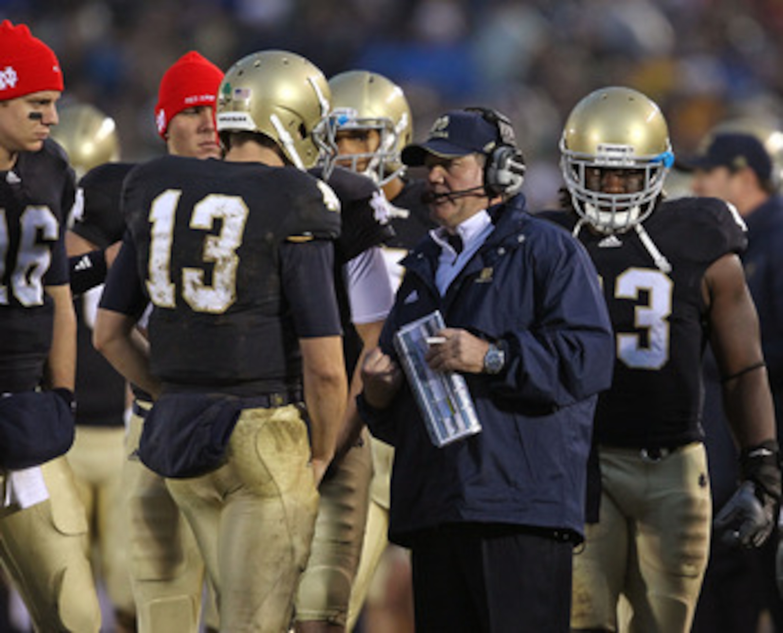 SOUTH BEND, IN - NOVEMBER 13: Head coach Brian Kelly of the Notre Dame Fighting Irish talks with Tommy Rees #13 during a game against the Utah Utes at Notre Dame Stadium on November 13, 2010 in South Bend, Indiana. Notre Dame defeated Utah 28-3. (Photo by SOUTH BEND, IN - NOVEMBER 13: Head coach Brian Kelly of the Notre Dame Fighting Irish talks with Tommy Rees #13 during a game against the Utah Utes at Notre Dame Stadium on November 13, 2010 in South Bend, Indiana. Notre Dame defeated Utah 28-3. (Photo by