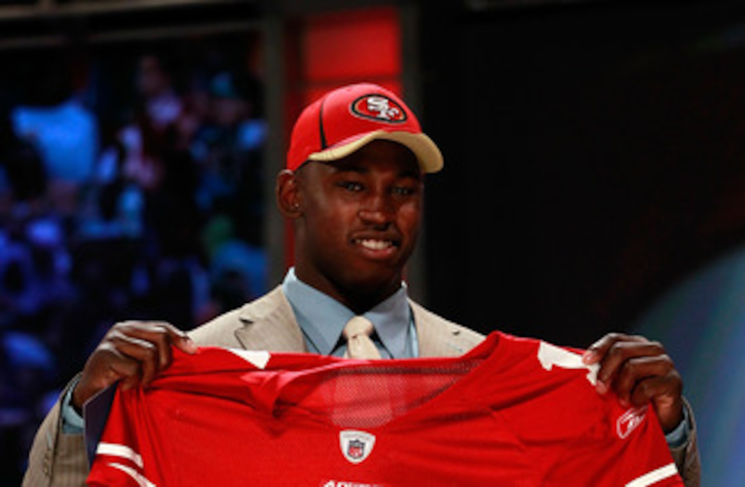 NEW YORK, NY - APRIL 28: Aldon Smith, #7 overall pick by the San Francisco 49ers, holds up a jersey on stage during the 2011 NFL Draft at Radio City Music Hall on April 28, 2011 in New York City. (Photo by Chris Trotman/Getty Images) NEW YORK, NY - APRIL 28: Aldon Smith, #7 overall pick by the San Francisco 49ers, holds up a jersey on stage during the 2011 NFL Draft at Radio City Music Hall on April 28, 2011 in New York City. (Photo by Chris Trotman/Getty Images)