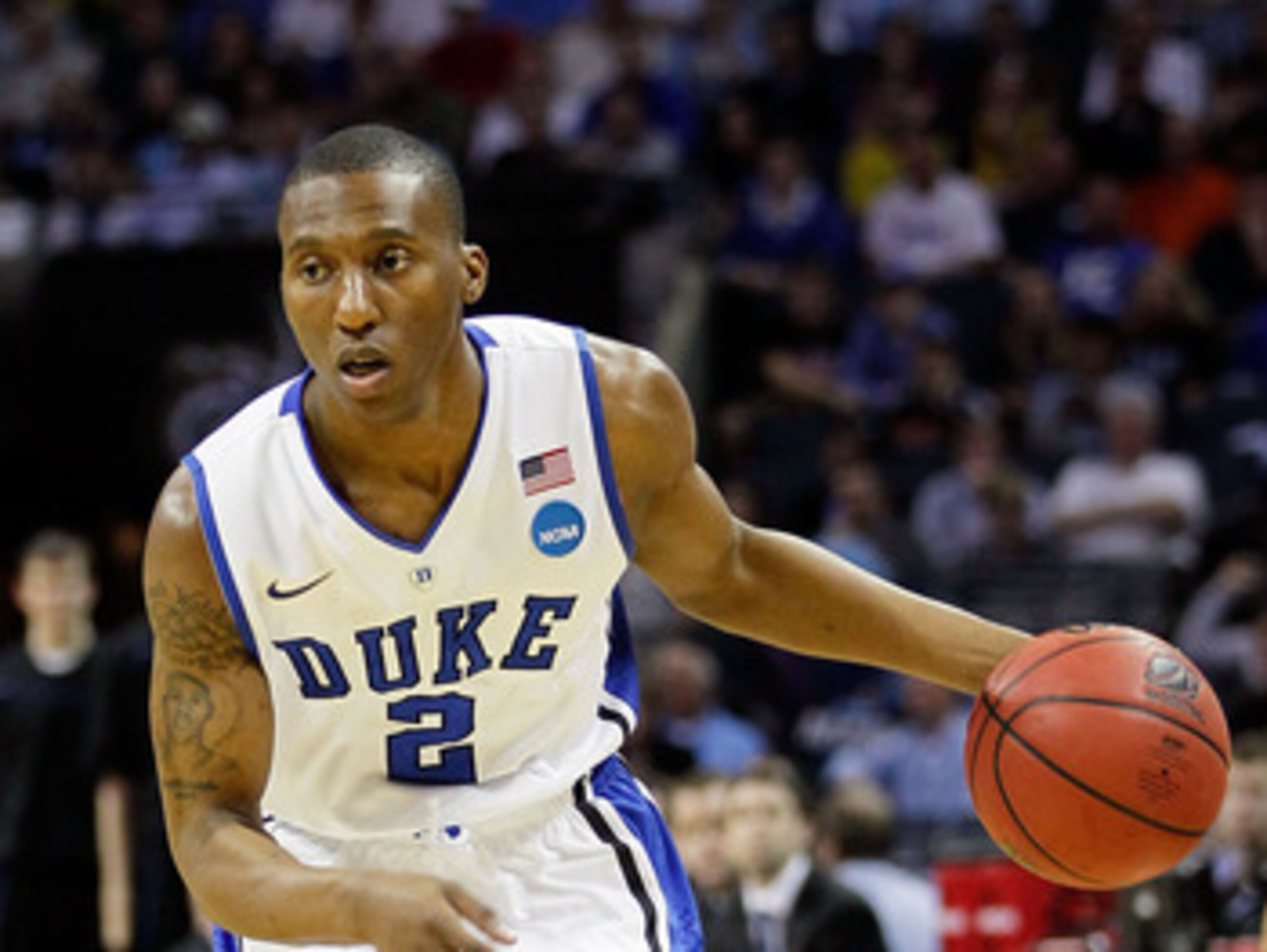 CHARLOTTE, NC - MARCH 20: Nolan Smith #2 of the Duke Blue Devils moves the ball while taking on the Michigan Wolverines during the third round of the 2011 NCAA men's basketball tournament at Time Warner Cable Arena on March 20, 2011 in Charlotte, North C CHARLOTTE, NC - MARCH 20: Nolan Smith #2 of the Duke Blue Devils moves the ball while taking on the Michigan Wolverines during the third round of the 2011 NCAA men's basketball tournament at Time Warner Cable Arena on March 20, 2011 in Charlotte, North C