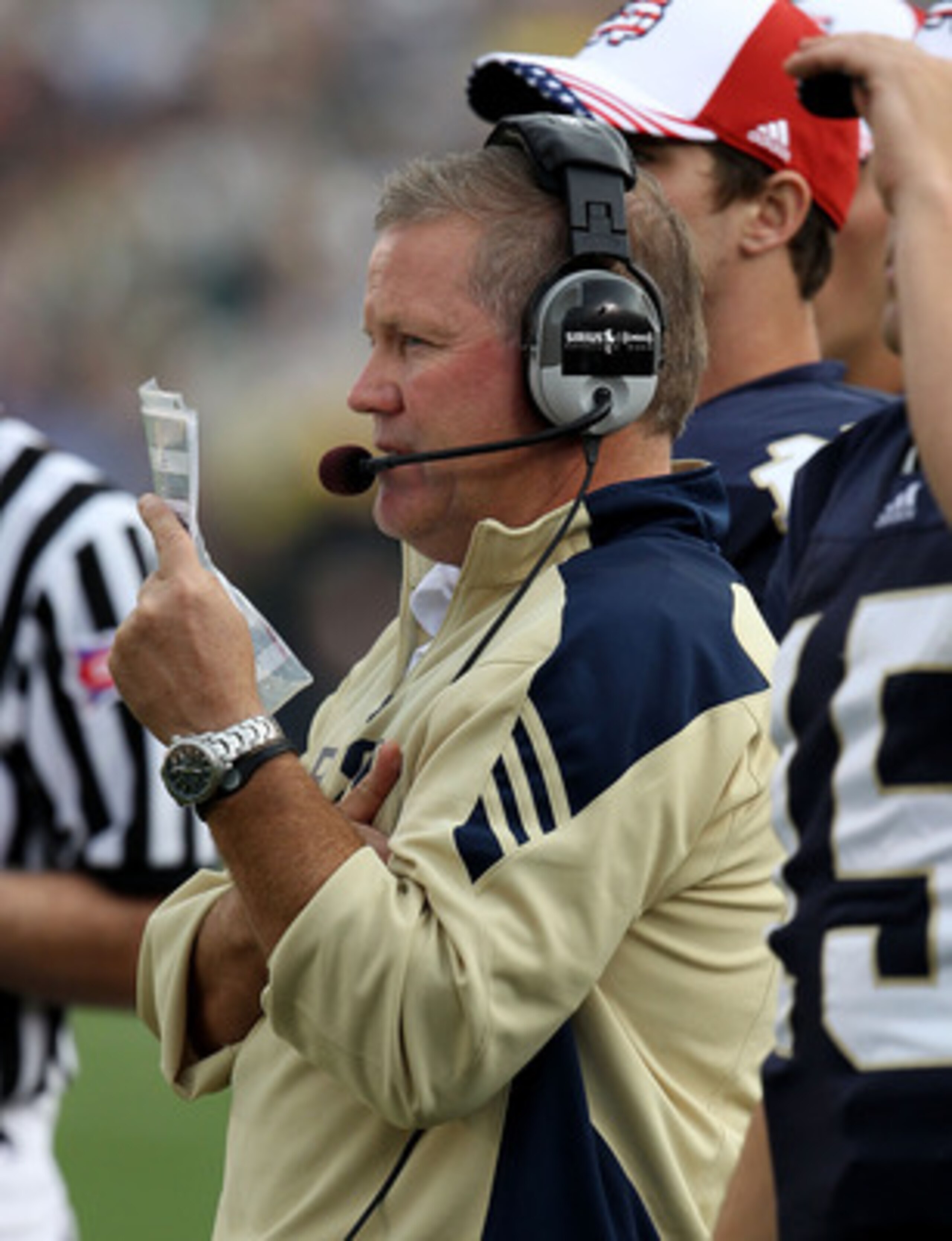 SOUTH BEND, IN - SEPTEMBER 11: Head coach Brian Kelly of the Notre Dame Fighting Irish watches as his team takes on the Michigan Wolverines at Notre Dame Stadium on September 11, 2010 in South Bend, Indiana. Michigan defeated Notre Dame 28-24. (Photo by SOUTH BEND, IN - SEPTEMBER 11: Head coach Brian Kelly of the Notre Dame Fighting Irish watches as his team takes on the Michigan Wolverines at Notre Dame Stadium on September 11, 2010 in South Bend, Indiana. Michigan defeated Notre Dame 28-24. (Photo by