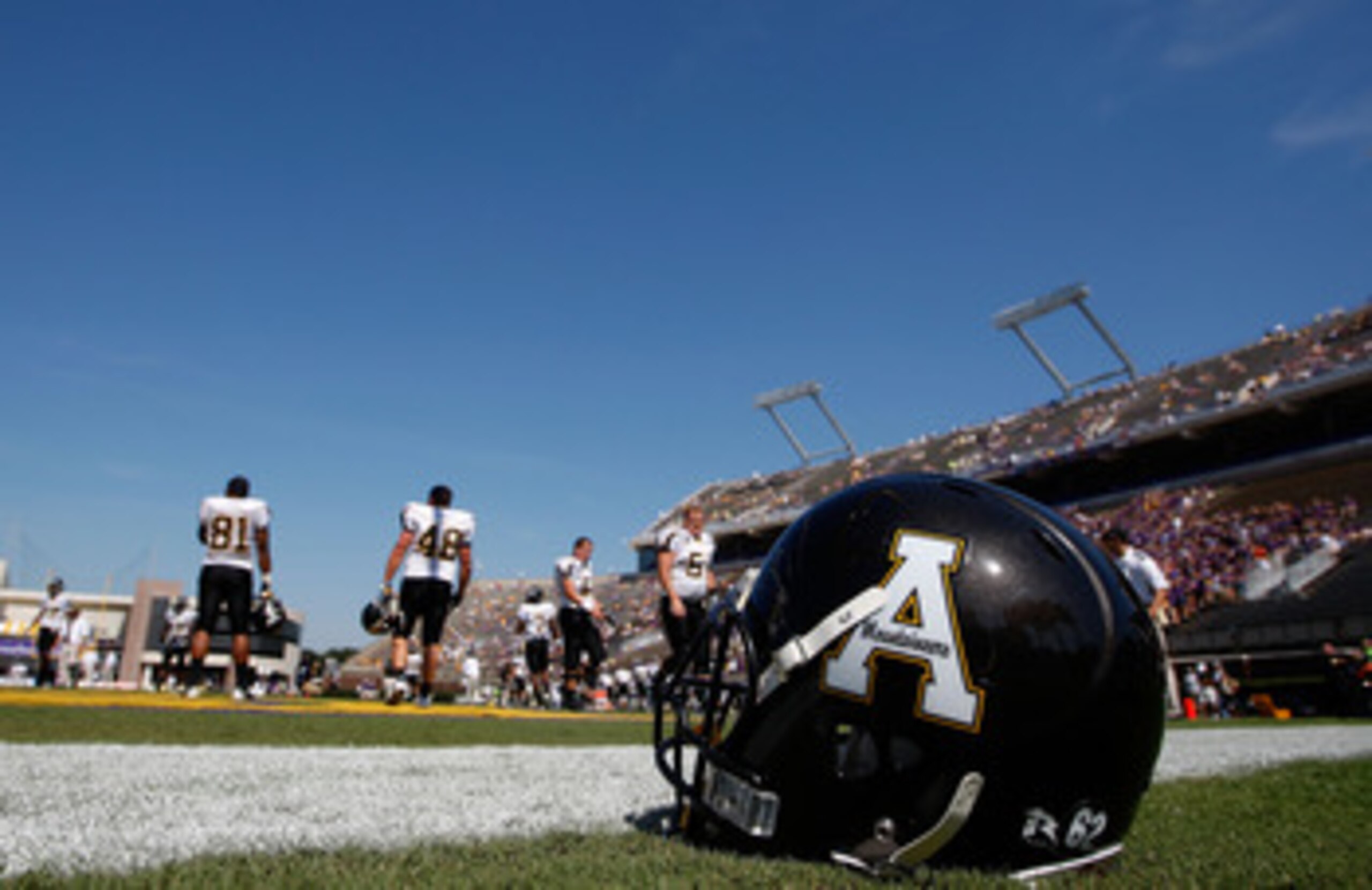 GREENVILLE, NC - SEPTEMBER 05: A football helmet sits on the sideline during warm-ups before the start of the Appalachian State Mountaineers versus East Carolina Pirates at Dowdy-Ficklen Stadium on September 5, 2009 in Greenville, North Carolina. (Photo GREENVILLE, NC - SEPTEMBER 05: A football helmet sits on the sideline during warm-ups before the start of the Appalachian State Mountaineers versus East Carolina Pirates at Dowdy-Ficklen Stadium on September 5, 2009 in Greenville, North Carolina. (Photo