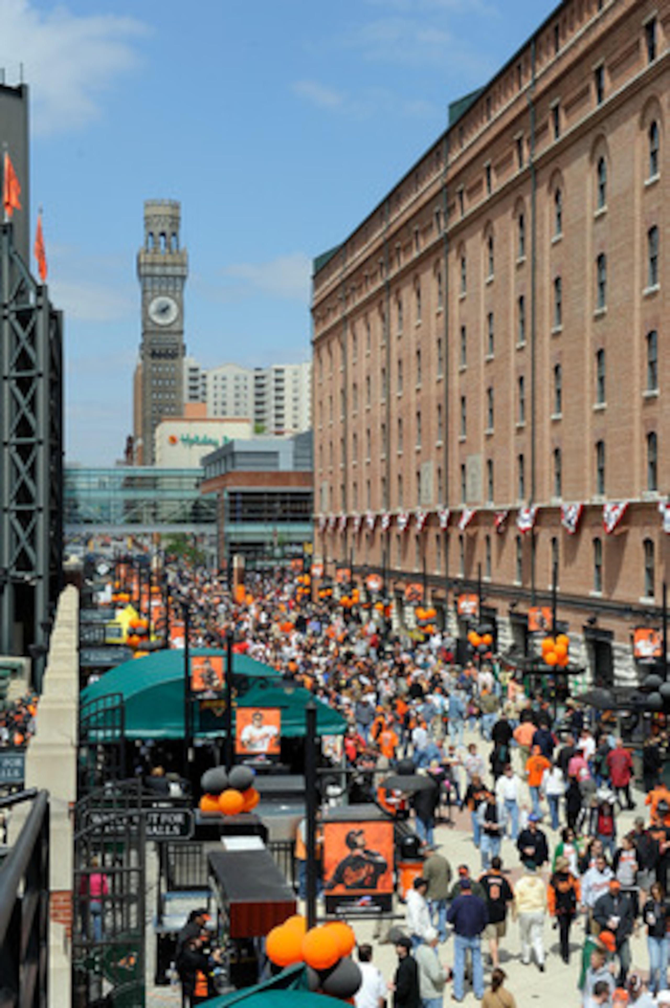 BALTIMORE - APRIL 09:  Fans walk down Eutaw Street before the game between the Baltimore Orioles and the Toronto Blue Jays on Opening Day at Camden Yards on April 9, 2010 in Baltimore, Maryland.  (Photo by Greg Fiume/Getty Images)
