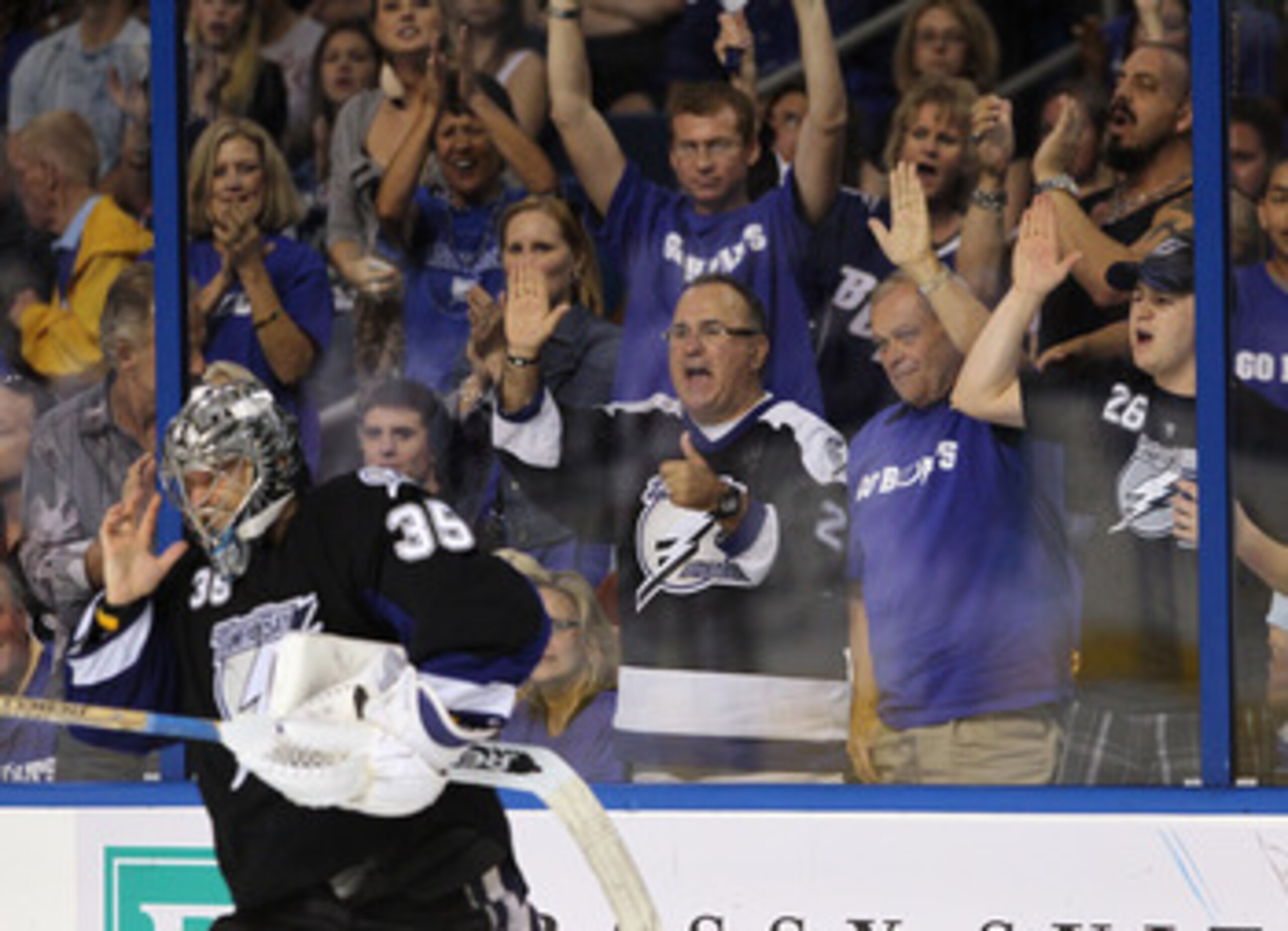 TAMPA, FL - MAY 03: Fans show their apprecaition to goaltender Dwayne Roloson #35 of the Tampa Bay Lightning in his game against the Washington Capitals  in Game Three of the Eastern Conference Semifinals during the 2011 NHL Stanley Cup Playoffs at St Pet