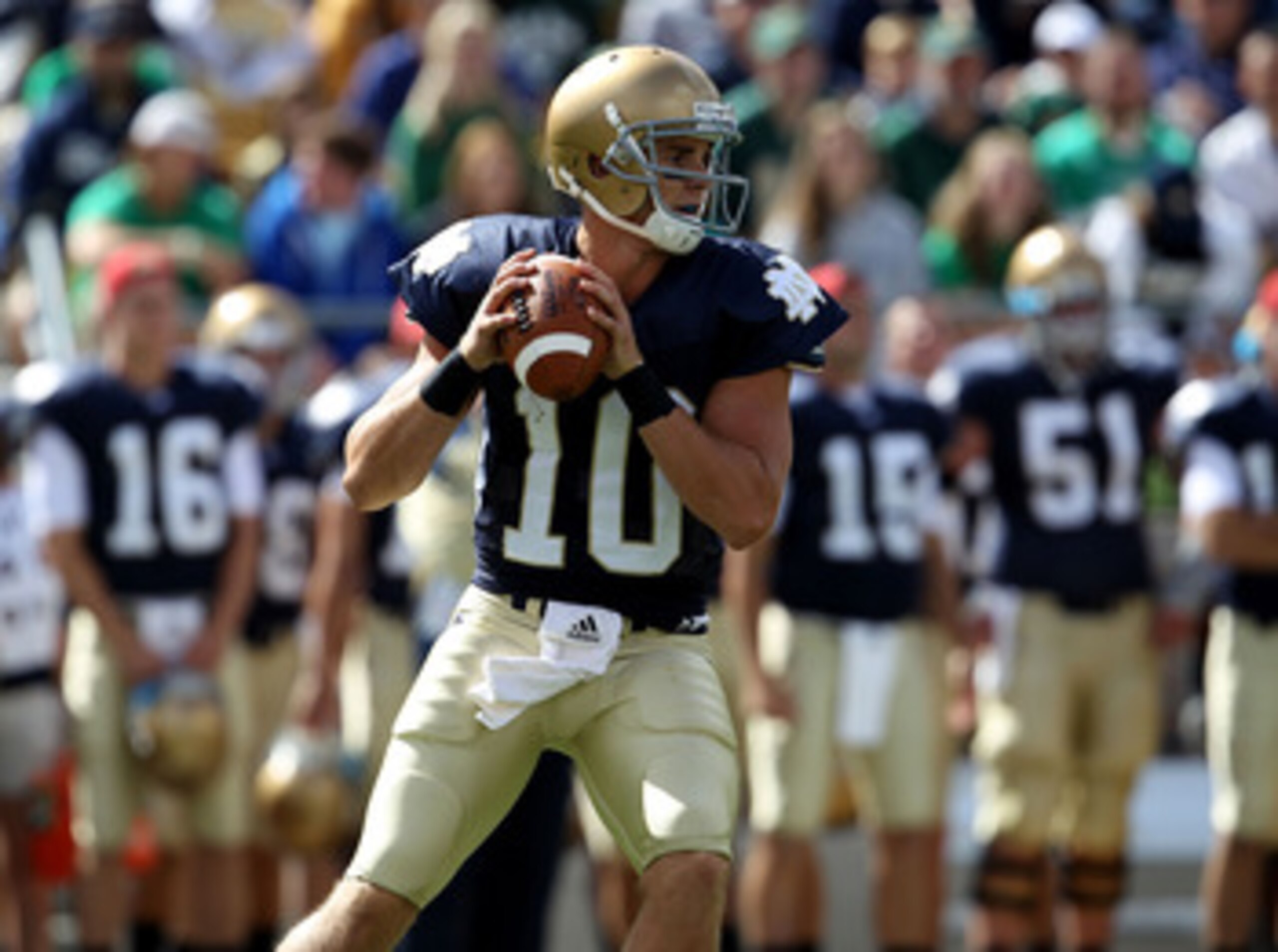 SOUTH BEND, IN - SEPTEMBER 04: Dayne Crist #10 of the Notre Dame Fighting Irish looks for a receiver against the Purdue Boilermakers at Notre Dame Stadium on September 4, 2010 in South Bend, Indiana. Notre Dame defeated Purdue 23-12. (Photo by Jonathan Da SOUTH BEND, IN - SEPTEMBER 04: Dayne Crist #10 of the Notre Dame Fighting Irish looks for a receiver against the Purdue Boilermakers at Notre Dame Stadium on September 4, 2010 in South Bend, Indiana. Notre Dame defeated Purdue 23-12. (Photo by Jonathan Da