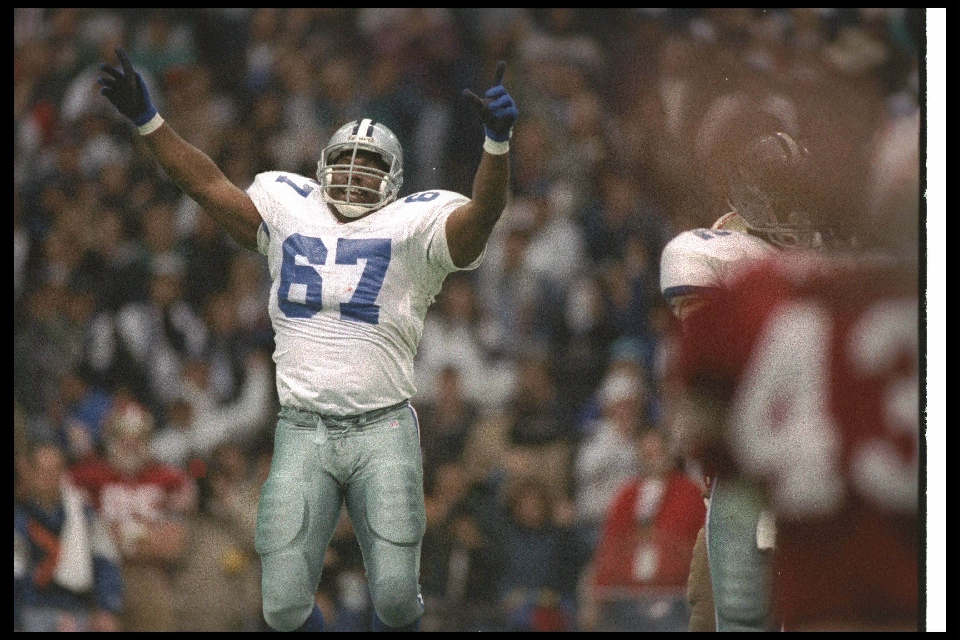 23 Jan 1994:  Defensive lineman Russell Maryland of the Dallas Cowboys celebrates during a playoff game against the San Francisco 49ers at Texas Stadium in Irving, Texas.  The Cowboys won the game, 38-21. Mandatory Credit: Mike Powell  /Allsport