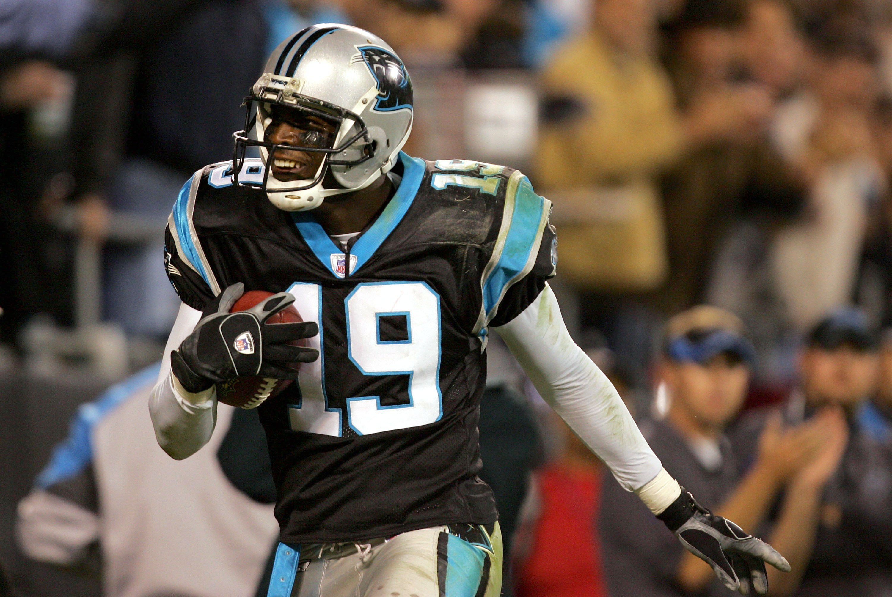 CHARLOTTE, NC - NOVEMBER 13:  Keyshawn Johnson #19 of the Carolina Panthers celebrates after scoring a touchdown against the Tampa Bay Buccaneers on November 13, 2006 at Bank of America Stadium in Charlotte, North Carolina. The Panthers defeated the Bucs 