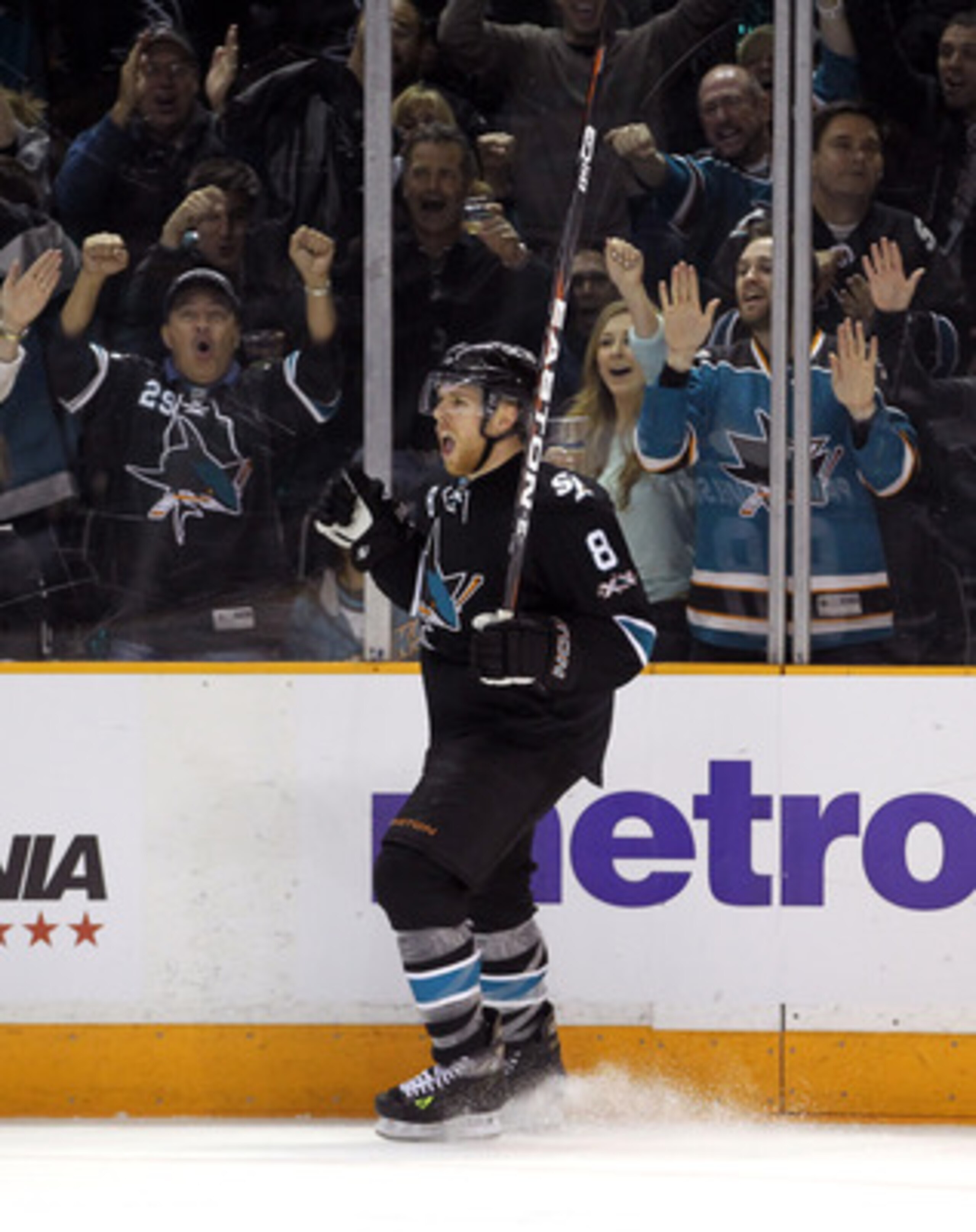 SAN JOSE, CA - APRIL 29:  Joe Pavelski #8 of the San Jose Sharks celebrates after he made a goal in the third period to tie their game against the Detroit Red Wings in Game One of the Western Conference Semifinals during the 2011 NHL Stanley Cup Playoffs
