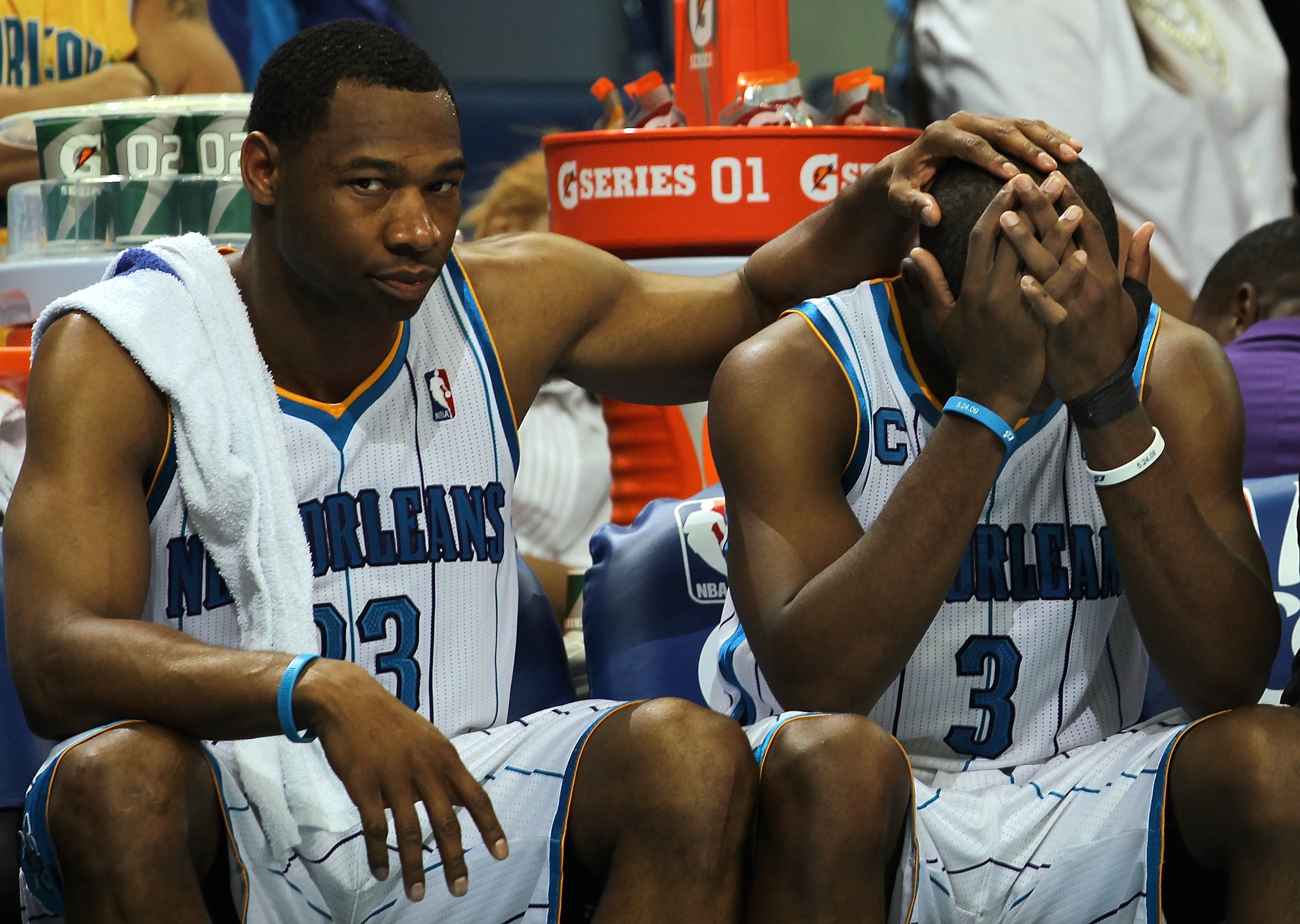NEW ORLEANS, LA - APRIL 28:  (L-R) Willie Green #33 and Chris Paul #3 of the New Orleans Hornets react on the bench during a 98-80 loss against the Los Angeles Lakers in Game Six of the Western Conference Quarterfinals in the 2011 NBA Playoffs on April 28