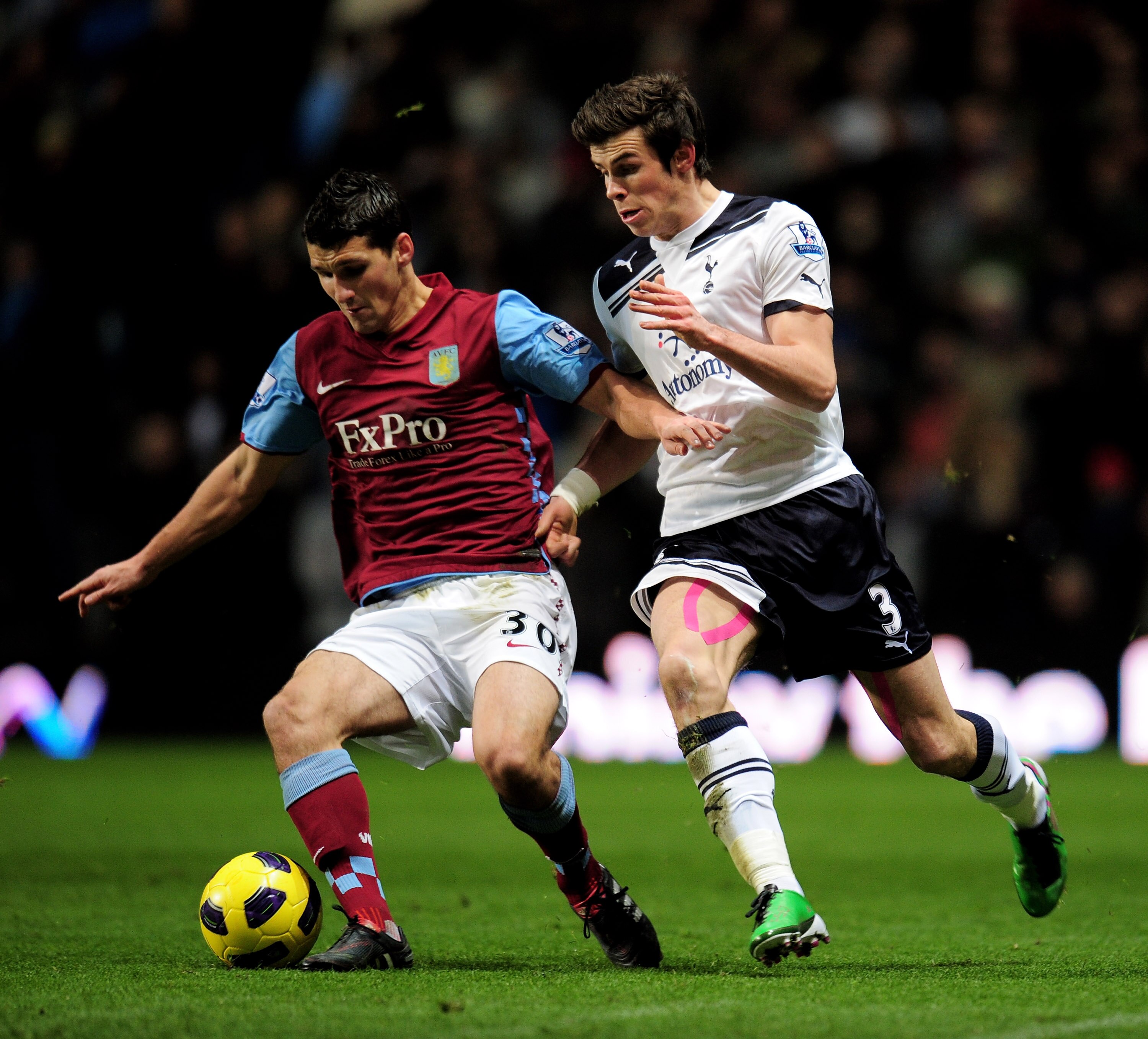 BIRMINGHAM, ENGLAND - DECEMBER 26:  Eric Lichaj (L) of Aston Villa in action against Gareth Bale (R) of Tottenham during the Barclays Premier League match between Aston Villa and Tottenham Hotspur at Villa Park on December 26, 2010 in Birmingham, England.