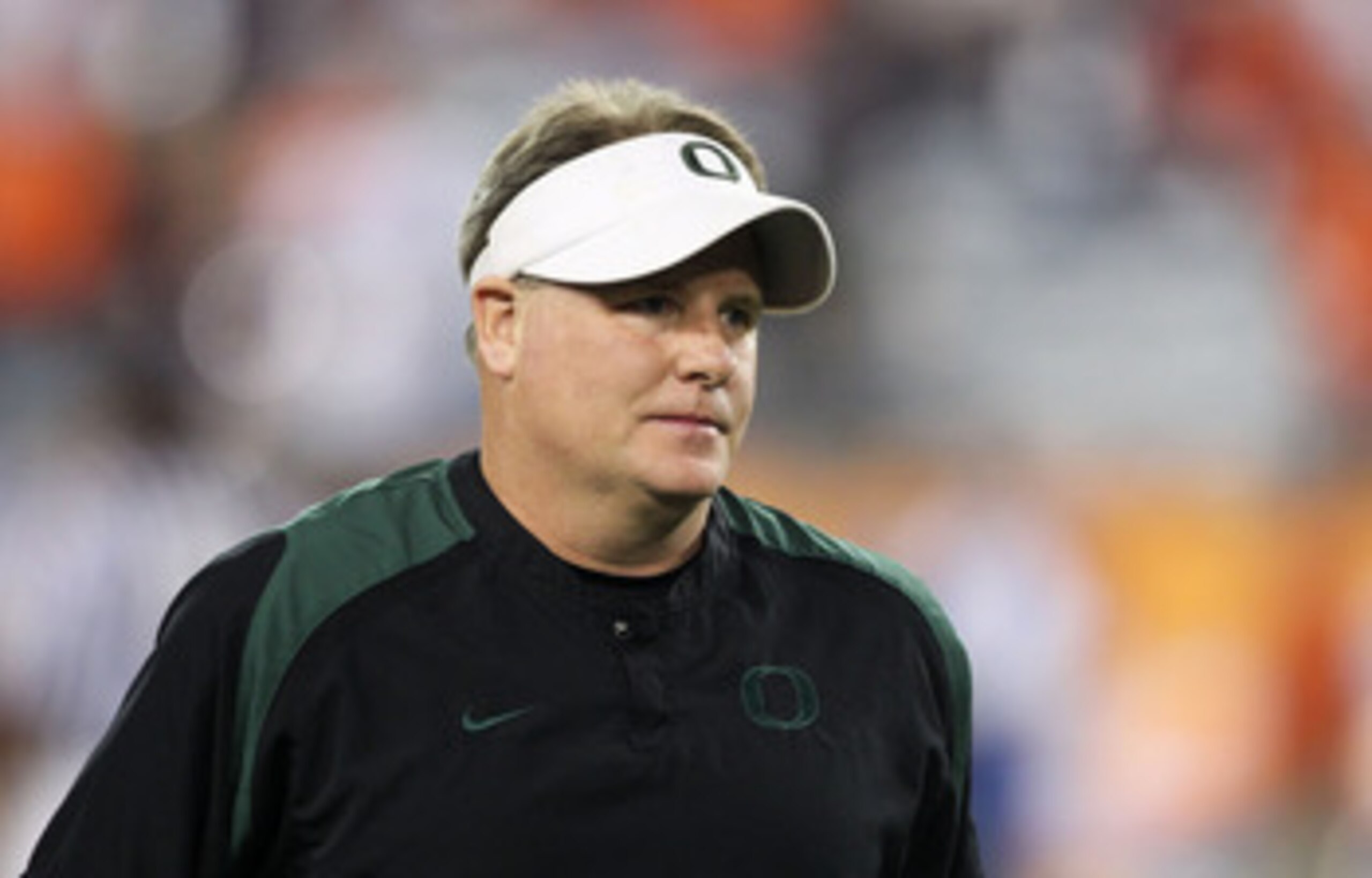 GLENDALE, AZ - JANUARY 10:  Head coach Chip Kelly of the Oregon Ducks looks on during their 22-19 loss to the Auburn Tigers during the Tostitos BCS National Championship Game at University of Phoenix Stadium on January 10, 2011 in Glendale, Arizona.  (Pho