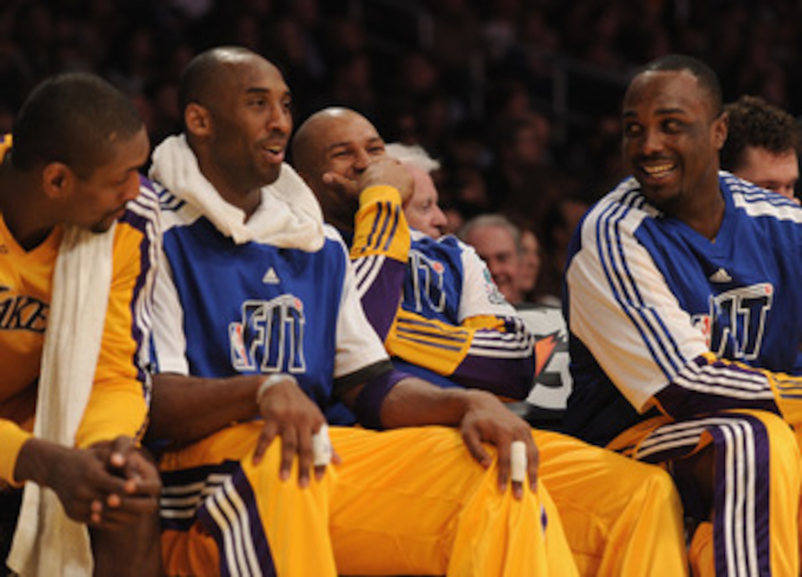 LOS ANGELES, CA - JANUARY 04:  Derek Fisher #2 of the Los Angeles Lakers laughs with Kobe Bryant #24 and Derrick Caracter #45 during the game against the Detroit Pistons at the Staples Center on January 4, 2011 in Los Angeles, California. NOTE TO USER: Us