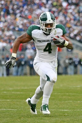 STATE COLLEGE, PA - NOVEMBER 27: Running back Edwin Baker #4 of the Michigan State Spartans carries the ball during a game against the Penn State Nittany Lions on November 27, 2010 at Beaver Stadium in State College, Pennsylvania. The Spartans won 28-22.(