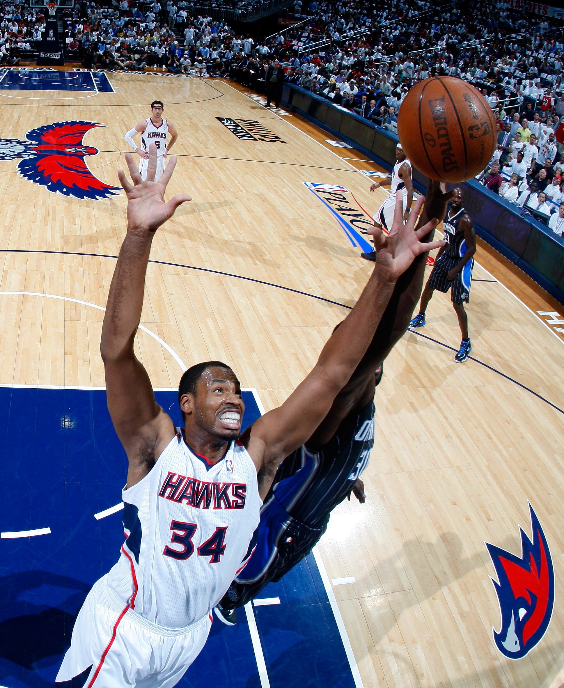 ATLANTA, GA - APRIL 28:  Jason Collins #34 of the Atlanta Hawks against the Orlando Magic during Game Six of the Eastern Conference Quarterfinals in the 2011 NBA Playoffs at Philips Arena on April 28, 2011 in Atlanta, Georgia.  NOTE TO USER: User expressl