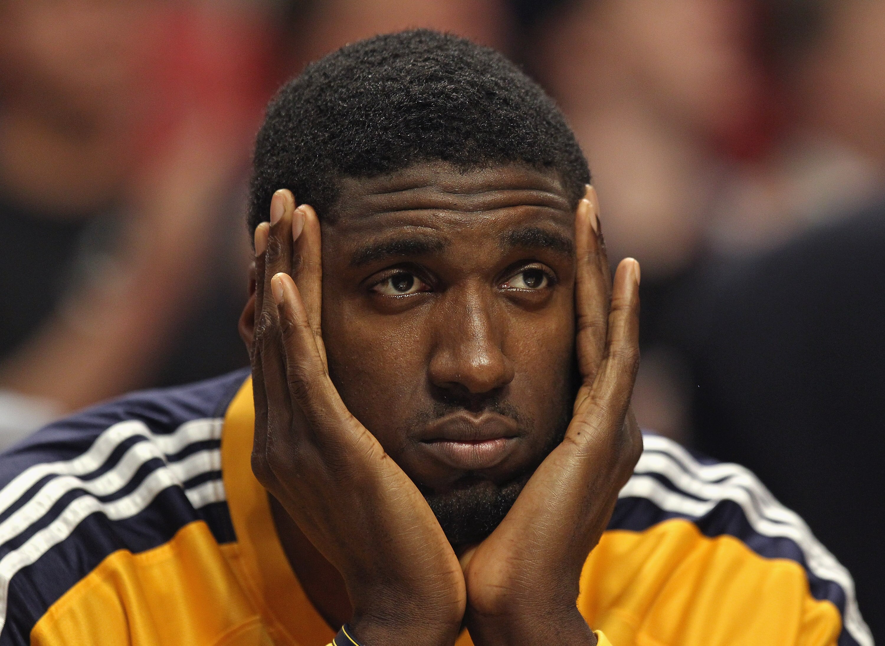 CHICAGO, IL - APRIL 26: Roy Hibbert #55 of the Indiana Pacers watches his teammates take on the Chicago Bulls from the bench in Game Five of the Eastern Conference Quarterfinals in the 2011 NBA Playoffs at the United Center on April 26, 2011 in Chicago, I