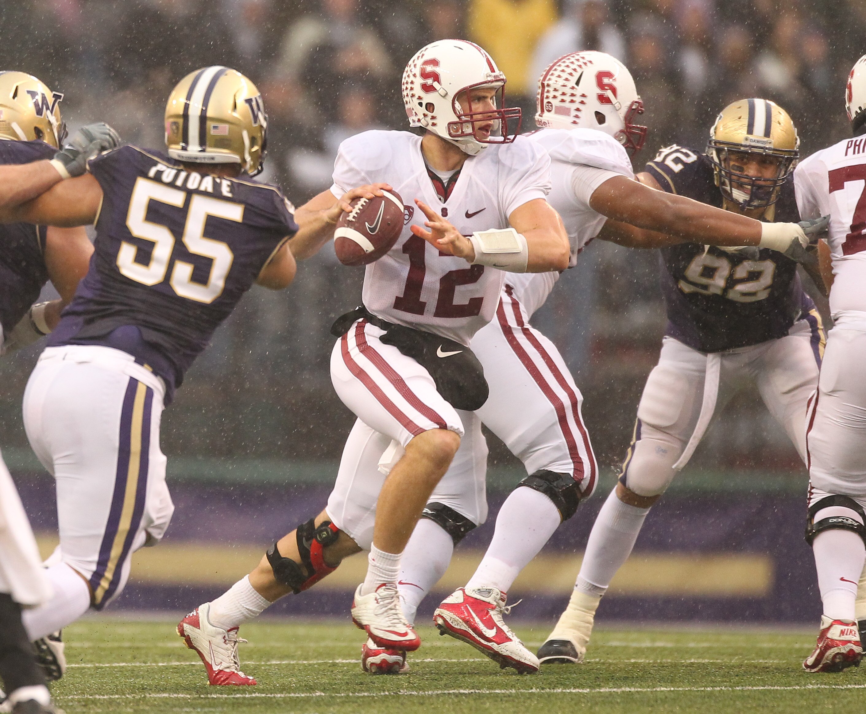 SEATTLE - OCTOBER 30:  Quarterback Andrew Luck #12 of the Stanford Cardinal looks for a receiver against the Washington Huskies on October 30, 2010 at Husky Stadium in Seattle, Washington. Stanford won 41-0. (Photo by Otto Greule Jr/Getty Images)