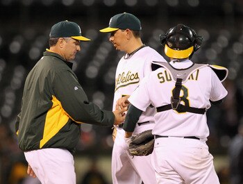 OAKLAND, CA - MAY 03:  Brian Fuentes #57 of the Oakland Athletics is taken out of the game by manager Bob Geren after he gave up three runs to the Cleveland Indians in the ninth inning at Oakland-Alameda County Coliseum on May 3, 2011 in Oakland, Californ