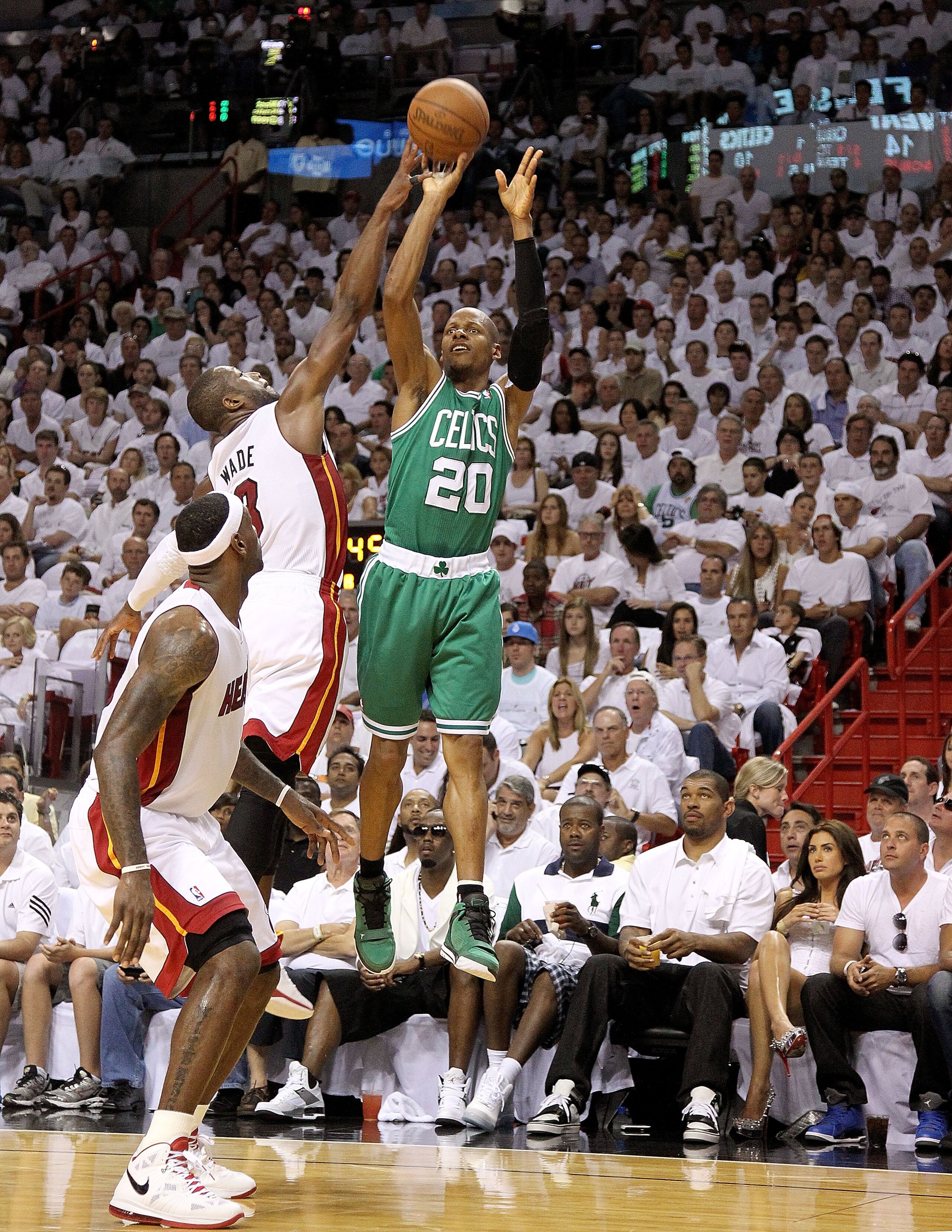MIAMI, FL - MAY 01:  Ray Allen #20 of the Boston Celtics shoots over Dwyane Wade #3 of the Miami Heat during Game One of the Eastern Conference Semifinals of the 2011 NBA Playoffs at American Airlines Arena on May 1, 2011 in Miami, Florida. NOTE TO USER: