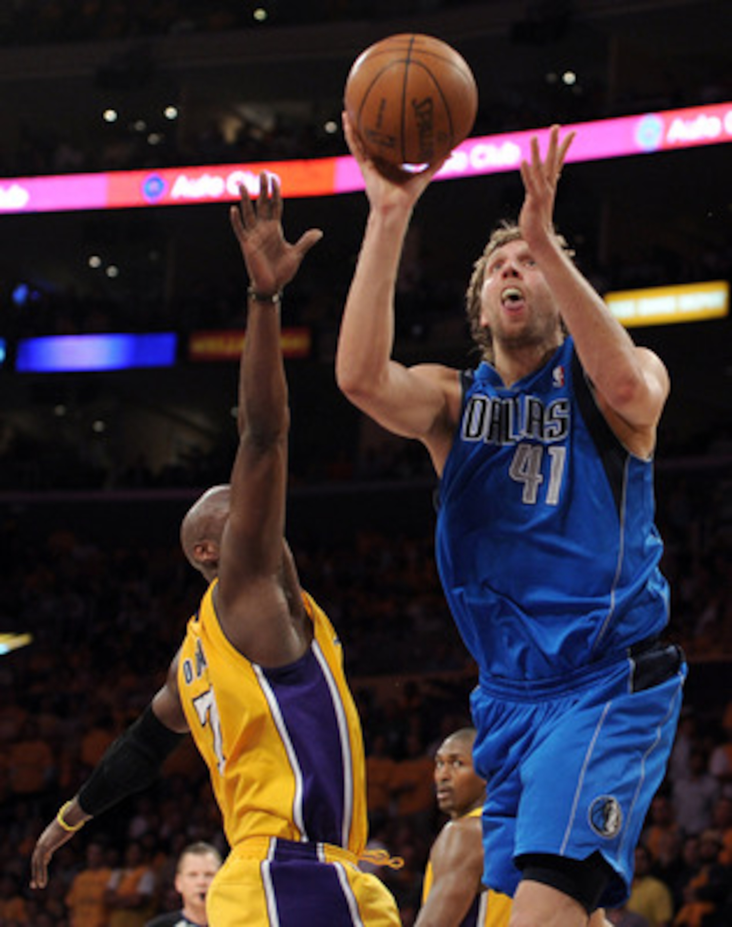 LOS ANGELES, CA - MAY 02:  Dirk Nowitzki #41 of the Dallas Mavericks goes up for a shot against Lamar Odom #7 of the Los Angeles Lakers in the second quarter in Game One of the Western Conference Semifinals in the 2011 NBA Playoffs at Staples Center on Ma