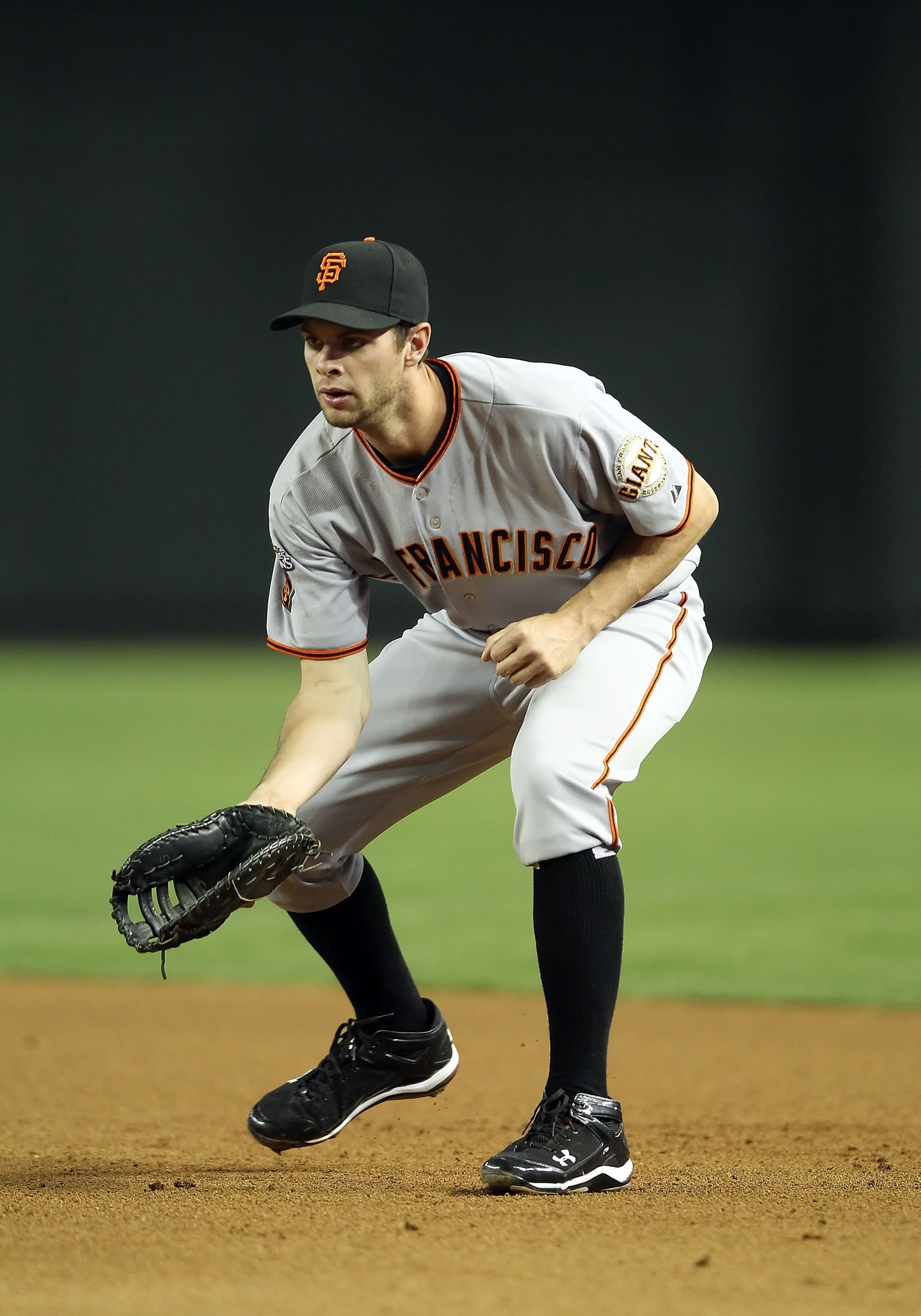 PHOENIX, AZ - APRIL 16:  Infielder Brandon Belt #9 of the San Francisco Giants in action during the Major League Baseball game against the Arizona Diamondbacks at Chase Field on April 16, 2011 in Phoenix, Arizona.  The Giants defeated the Diamondbacks 5-3