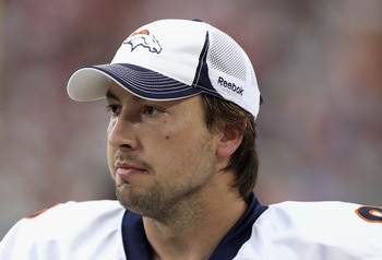 GLENDALE, AZ - DECEMBER 12: Quarterback Kyle Orton #8 of the Denver Broncos stands on the sideline during the NFL game against the Arizona Cardinals at the University of Phoenix Stadium on December 12, 2010 in Glendale, Arizona. The Cardinals defeated the