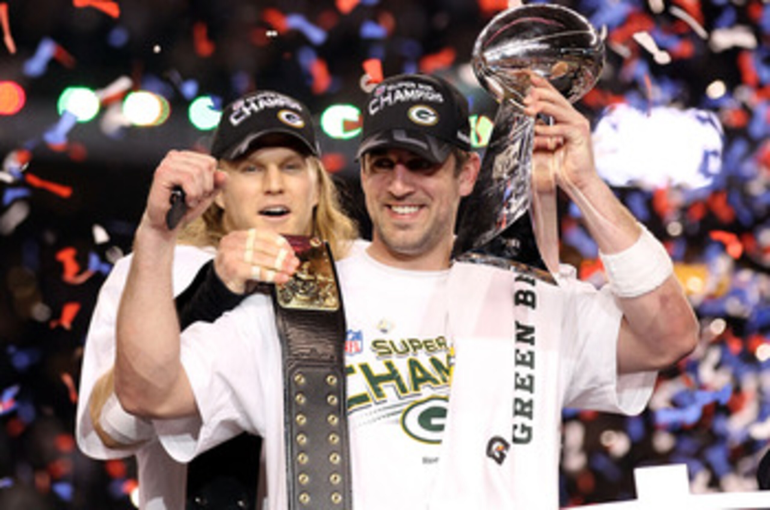 ARLINGTON, TX - FEBRUARY 06:  Super Bowl MVP Aaron Rodgers #12 of the Green Bay Packers holds up the Vince Lombardi Trophy as Clay Matthews #52 looks on after winning Super Bowl XLV 31-25 against the Pittsburgh Steelers at Cowboys Stadium on February 6, 2