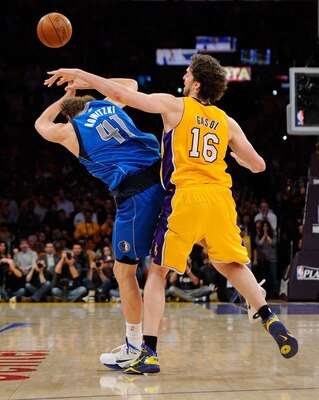 LOS ANGELES, CA - MAY 02:  Pau Gasol #16 of the Los Angeles Lakers fouls Dirk Nowitzki #41 of the Dallas Mavericks late in the fourth quarter in Game One of the Western Conference Semifinals in the 2011 NBA Playoffs at Staples Center on May 2, 2011 in Los