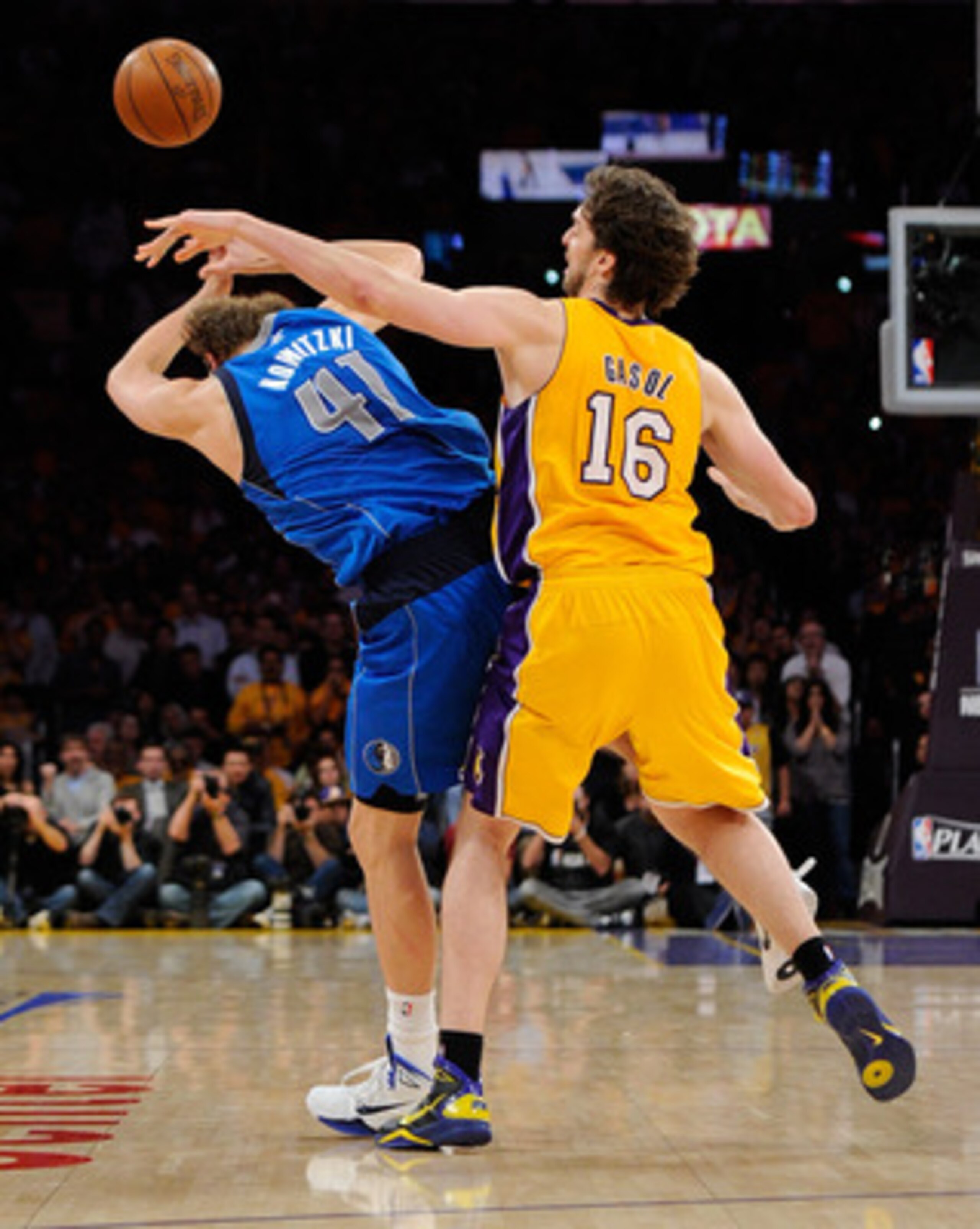 LOS ANGELES, CA - MAY 02:  Pau Gasol #16 of the Los Angeles Lakers fouls Dirk Nowitzki #41 of the Dallas Mavericks late in the fourth quarter in Game One of the Western Conference Semifinals in the 2011 NBA Playoffs at Staples Center on May 2, 2011 in Los