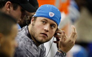 DETROIT - DECEMBER 05: Matthew Stafford #9 of the Detroit Lions sits on the sideline during the game against the Chicago Bears at Ford Field on December 5, 2010 in Detroit, Michigan. The Bears defeated the Lions 24-20.  (Photo by Leon Halip/Getty Images)