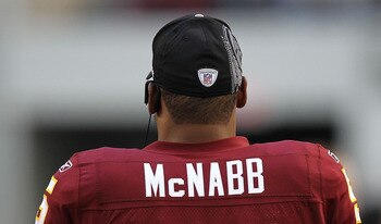 ARLINGTON, TX - DECEMBER 19:  Quarterback Donovan McNabb #5  of the Washington Redskins on the sidelines against play against the Dallas Cowboys at Cowboys Stadium on December 19, 2010 in Arlington, Texas.  (Photo by Ronald Martinez/Getty Images)