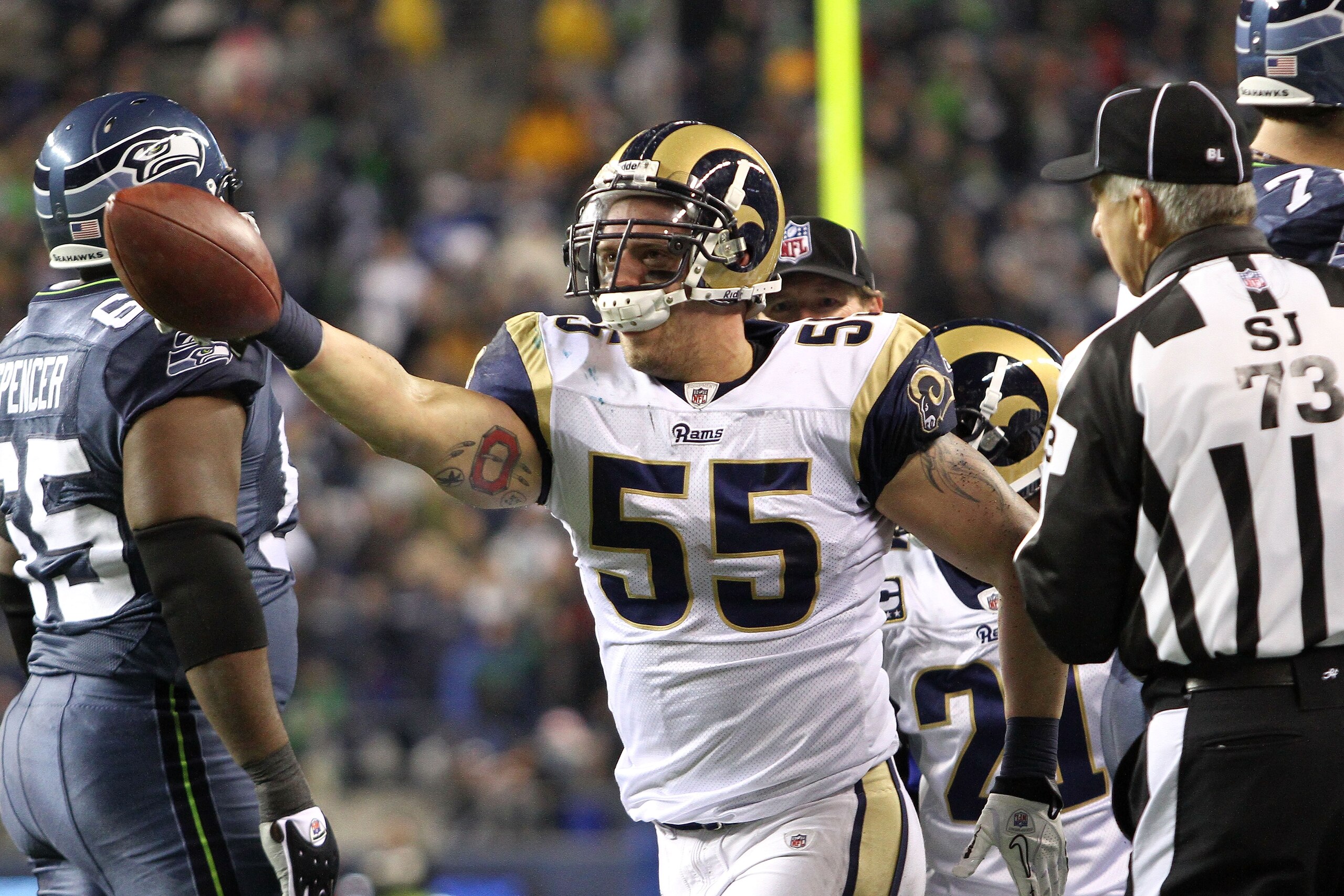 SEATTLE, WA - JANUARY 02:  James Laurinaitis #55 of the St. Louis Rams celebrates recovering a fumble by the Seattle Seahawks during their game at Qwest Field on January 2, 2011 in Seattle, Washington.  (Photo by Otto Greule Jr/Getty Images)