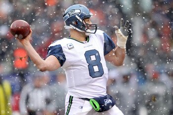 CHICAGO, IL - JANUARY 16:  Quarterback Matt Hasselbeck #8 of the Seattle Seahawks looks to pass against the Chicago Bears in the 2011 NFC divisional playoff game at Soldier Field on January 16, 2011 in Chicago, Illinois.  (Photo by Andy Lyons/Getty Images