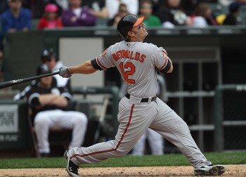 CHICAGO, IL - MAY 01: Mark Reynolds #12 of the Baltimore Orioles hits the ball against the Chicago White Sox at U.S. Cellular Field on May 1, 2011 in Chicago, Illinois. The Orioles defeated the White Sox 6-4. (Photo by Jonathan Daniel/Getty Images)