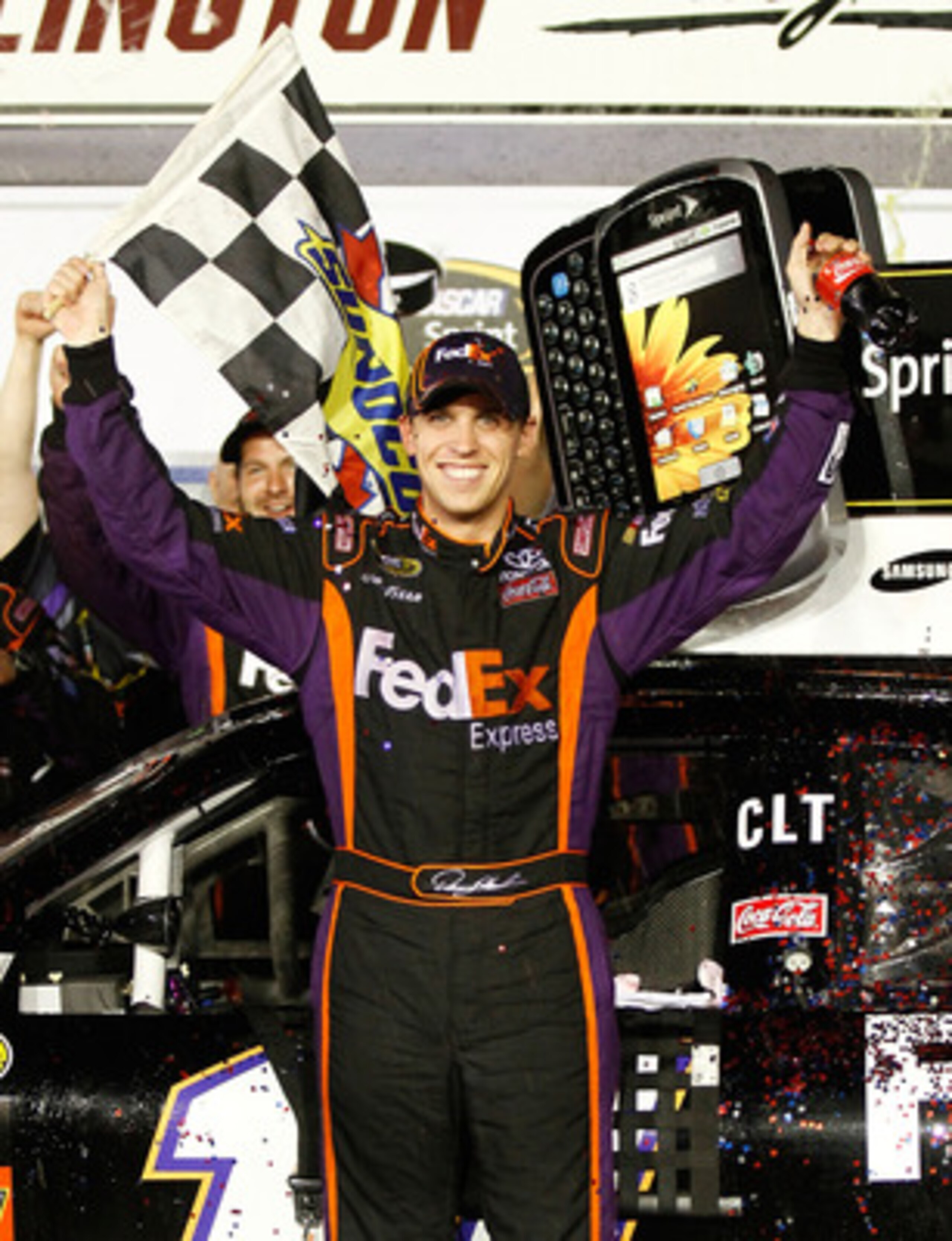 DARLINGTON, SC - MAY 08:  Denny Hamlin, driver of the #11 FedEx Express Toyota, celebrates in victory lane after he won the NASCAR Sprint Cup series SHOWTIME Southern 500 at Darlington Raceway on May 8, 2010 in Darlington, South Carolina.  (Photo by Jason