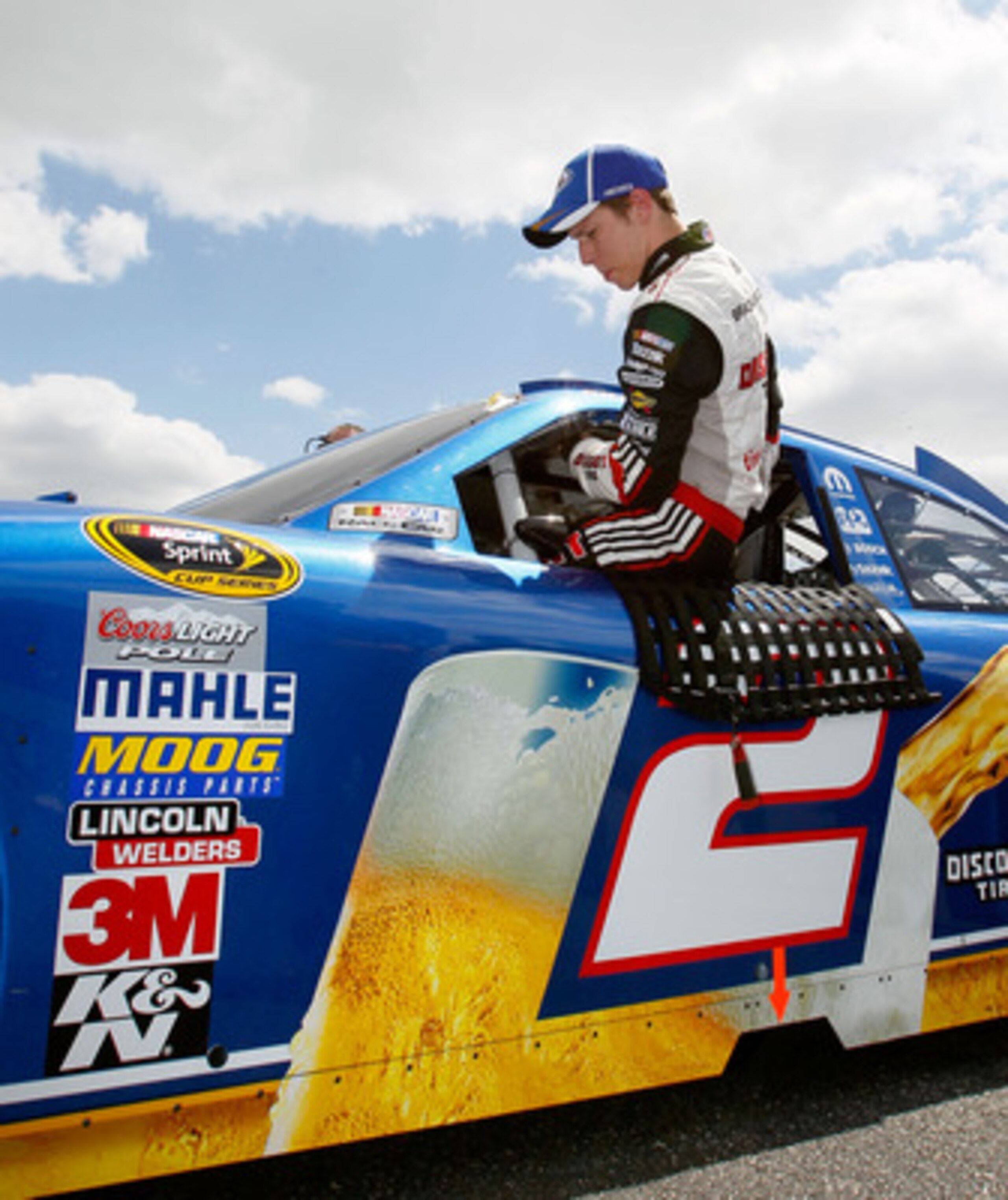 TALLADEGA, AL - APRIL 16:  Brad Keselowski, driver of the #2 Miller Lite Dodge, climbs out of his after qualifying for the NASCAR Sprint Cup Series Aaron's 499 at Talladega Superspeedway on April 16, 2011 in Talladega, Alabama.  (Photo by Kevin C. Cox/Get