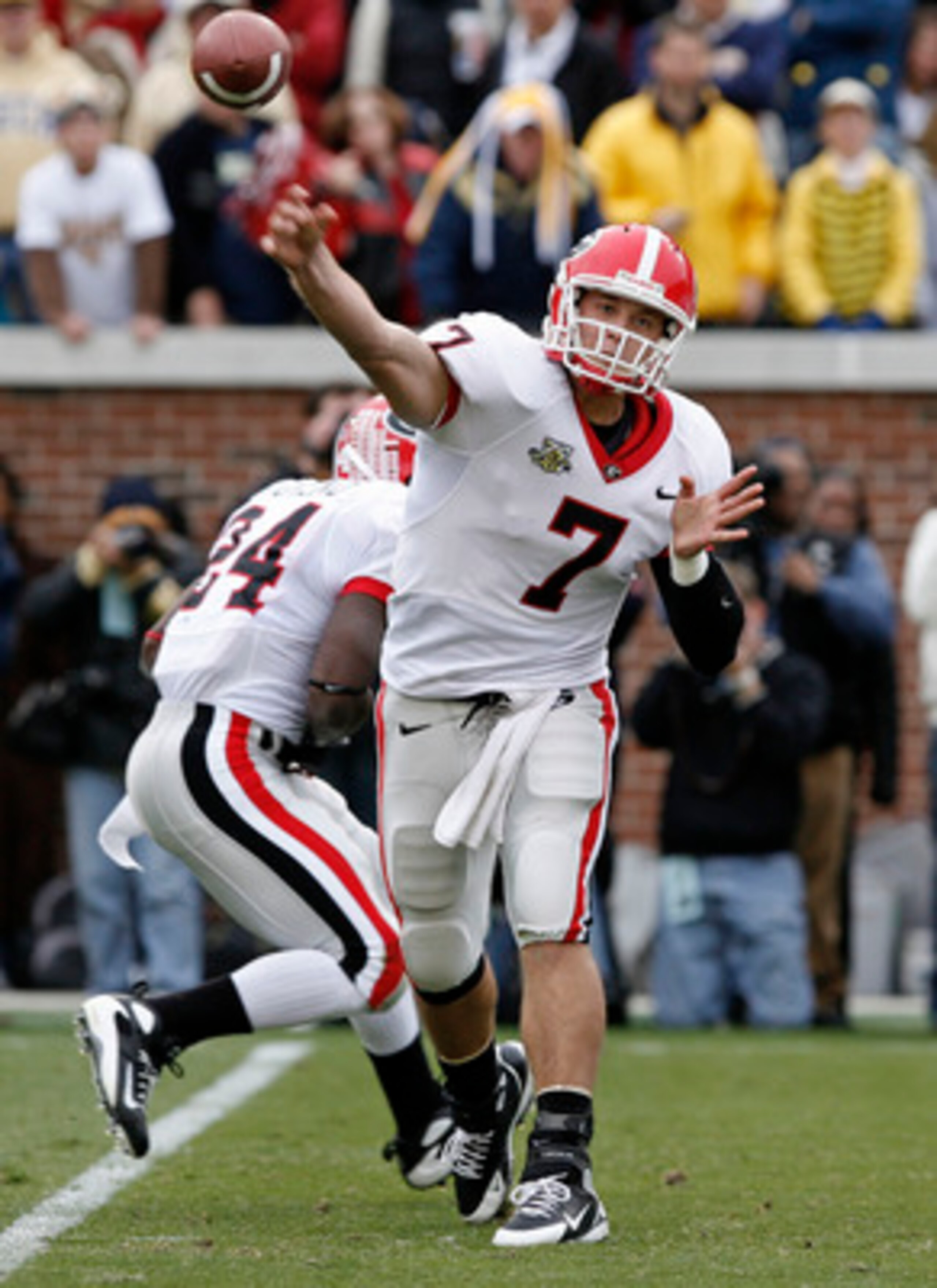 ATLANTA - NOVEMBER 24: Quarterback Matthew Stafford #7 of the Georgia Bulldogs throws a screen pass during the game against the Georgia Tech Yellow Jackets on November 24, 2007 at Bobby Dodd Stadium at Historic Grant Field in Atlanta, Georgia.  (Photo by 