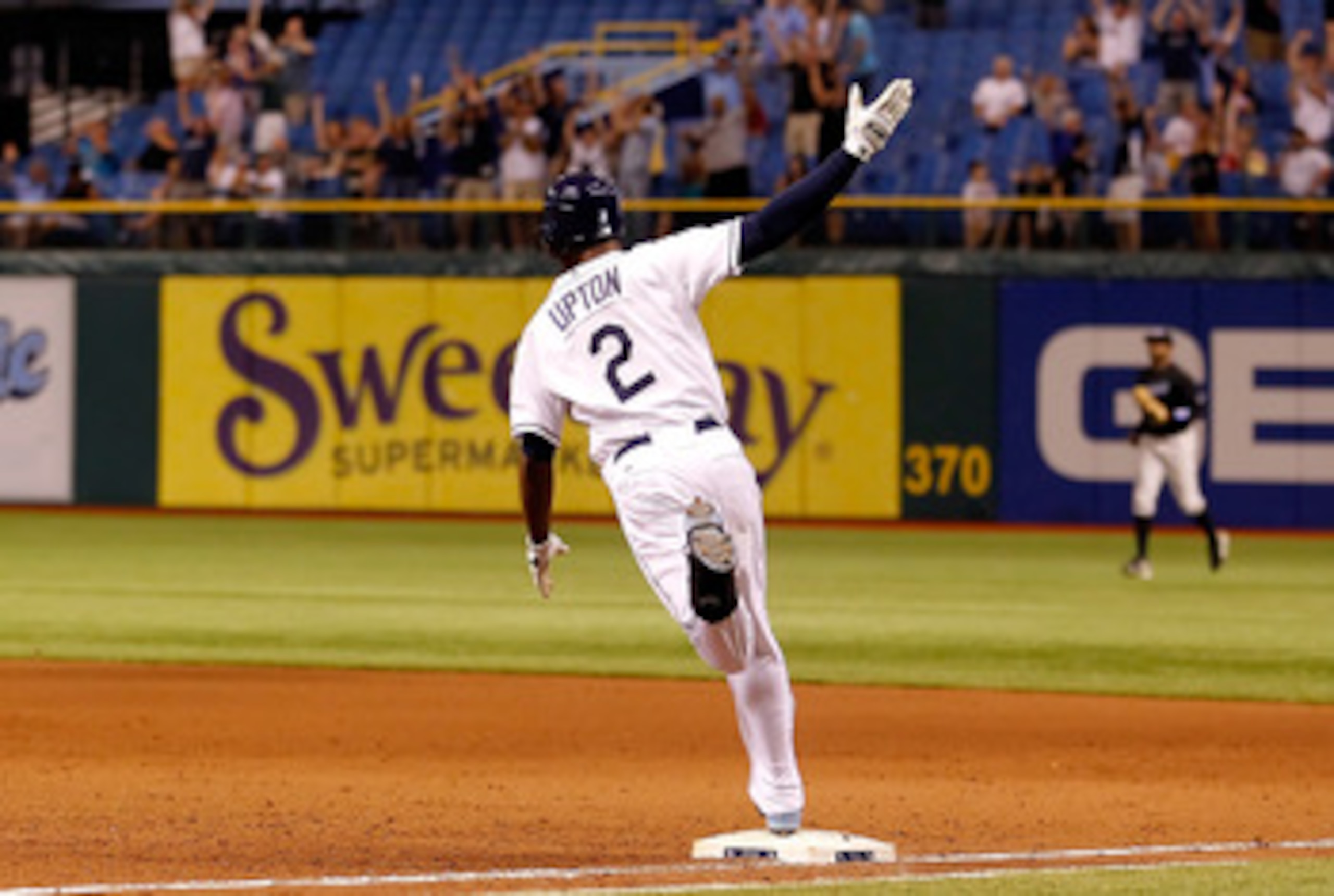 ST. PETERSBURG, FL - MAY 03:  Outfielder B.J. Upton #2 of the Tampa Bay Rays celebrates his two run walkoff home run against the Toronto Blue Jays at Tropicana Field on May 3, 2011 in St. Petersburg, Florida.  (Photo by J. Meric/Getty Images)