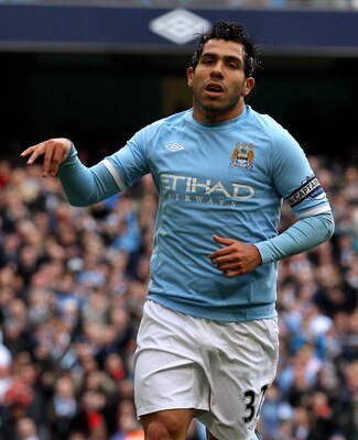 MANCHESTER, ENGLAND - APRIL 03:  Carlos Tevez of Manchester City celebrates scoring his team's second goal, from a penalty during the Barclays Premier League match between Manchester City and Sunderland at the City of Manchester Stadium on April 3, 2011 i