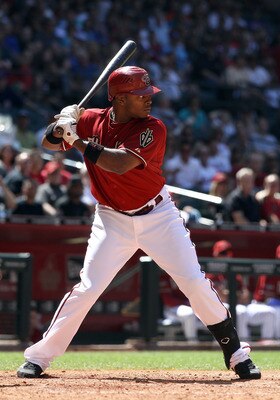 PHOENIX, AZ - MAY 01:  Justin Upton #10 of the Arizona Diamondbacks bats against the Chicago Cubs during the Major League Baseball game at Chase Field on May 1, 2011 in Phoenix, Arizona. The Diamondbacks defeated the Cubs 4-3.  (Photo by Christian Peterse